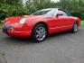 2002 Red /Red Ford Thunderbird Deluxe (1FAHP60A62Y) with an 3.9L V8 DOHC 32V engine, 5-Speed Automatic Overdrive transmission, located at 6528 Lower York Road, New Hope, PA, 18938, (215) 862-9555, 40.358707, -74.977882 - Here we have a beautifully kept, 14,XXX original miles, one owner Ford Thunderbird Deluxe with a 3.9L V8 putting power to the rear wheels via a smooth shifting automatic transmission. This vehicle has a clean Carfax reporting no accidents and one owner! Garage kept its whole life. All servicing done - Photo#0