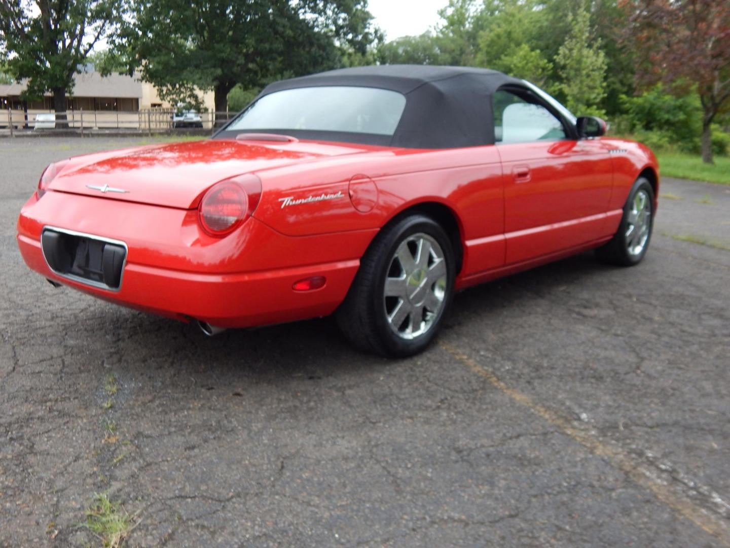 2002 Red /Red Ford Thunderbird Deluxe (1FAHP60A62Y) with an 3.9L V8 DOHC 32V engine, 5-Speed Automatic Overdrive transmission, located at 6528 Lower York Road, New Hope, PA, 18938, (215) 862-9555, 40.358707, -74.977882 - Here we have a beautifully kept, 14,XXX original miles, one owner Ford Thunderbird Deluxe with a 3.9L V8 putting power to the rear wheels via a smooth shifting automatic transmission. This vehicle has a clean Carfax reporting no accidents and one owner! Garage kept its whole life. All servicing done - Photo#4