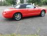 2002 Red /Red Ford Thunderbird Deluxe (1FAHP60A62Y) with an 3.9L V8 DOHC 32V engine, 5-Speed Automatic Overdrive transmission, located at 6528 Lower York Road, New Hope, PA, 18938, (215) 862-9555, 40.358707, -74.977882 - Here we have a beautifully kept, 14,XXX original miles, one owner Ford Thunderbird Deluxe with a 3.9L V8 putting power to the rear wheels via a smooth shifting automatic transmission. This vehicle has a clean Carfax reporting no accidents and one owner! Garage kept its whole life. All servicing done - Photo#5