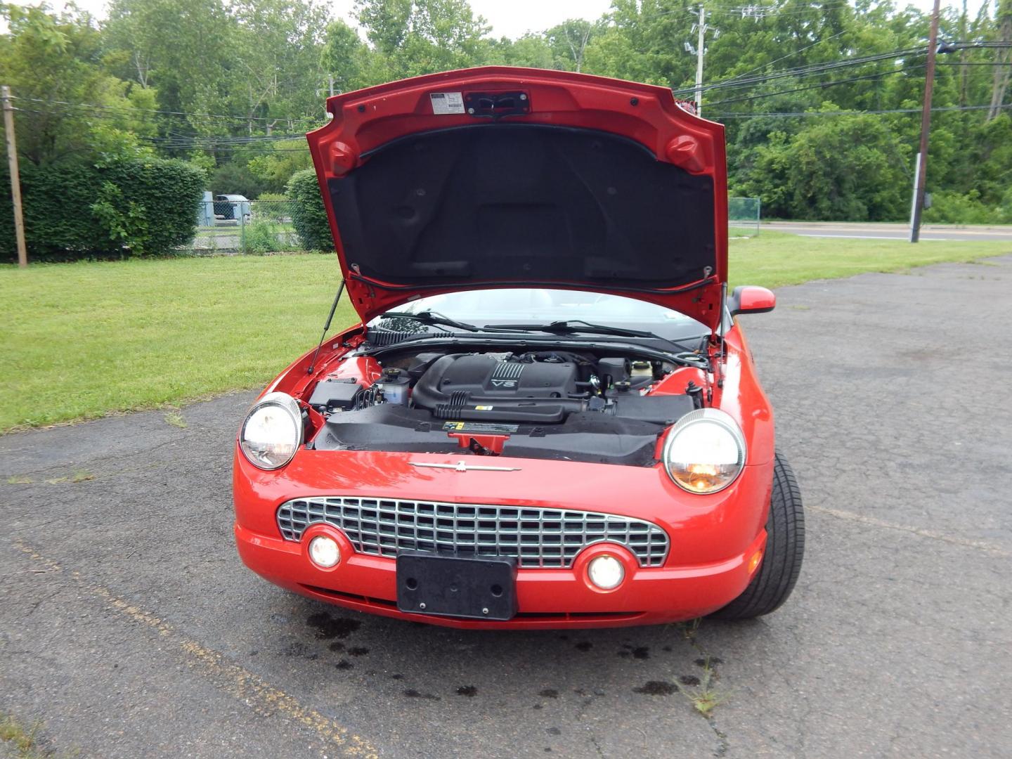 2002 Red /Red Ford Thunderbird Deluxe (1FAHP60A62Y) with an 3.9L V8 DOHC 32V engine, 5-Speed Automatic Overdrive transmission, located at 6528 Lower York Road, New Hope, PA, 18938, (215) 862-9555, 40.358707, -74.977882 - Here we have a beautifully kept, 14,XXX original miles, one owner Ford Thunderbird Deluxe with a 3.9L V8 putting power to the rear wheels via a smooth shifting automatic transmission. This vehicle has a clean Carfax reporting no accidents and one owner! Garage kept its whole life. All servicing done - Photo#22
