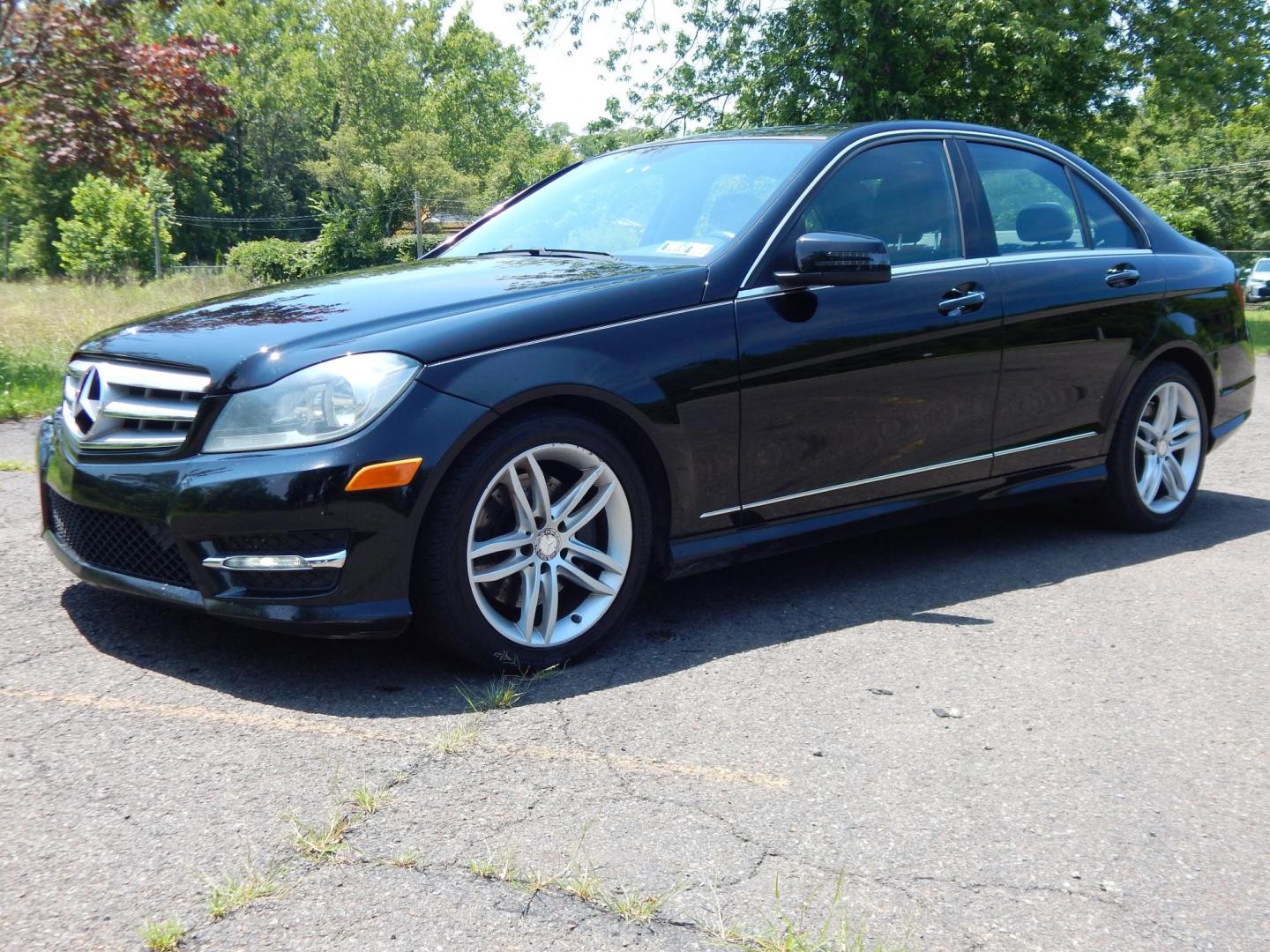 2013 Black /Black Mercedes-Benz C-Class C300 4MATIC Sport Sedan (WDDGF8AB1DG) with an 3.5L V6 engine, 7-Speed Automatic transmission, located at 6528 Lower York Road, New Hope, PA, 18938, (215) 862-9555, 40.358707, -74.977882 - Here we have a Mercedes Benz C300 with a 3.5L V6 putting power to all four wheels via a smooth shifting automatic transmission. Options include: black leather, wood trim, dual power seats, dual front heated seats, dual climate control, AM/FM/CD/AUX/BLUETOOTH/AUX radio with navigation and Harman/Kard - Photo#0