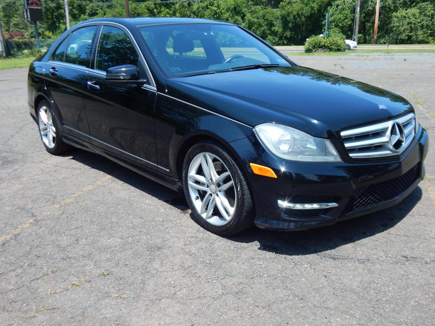 2013 Black /Black Mercedes-Benz C-Class C300 4MATIC Sport Sedan (WDDGF8AB1DG) with an 3.5L V6 engine, 7-Speed Automatic transmission, located at 6528 Lower York Road, New Hope, PA, 18938, (215) 862-9555, 40.358707, -74.977882 - Here we have a Mercedes Benz C300 with a 3.5L V6 putting power to all four wheels via a smooth shifting automatic transmission. Options include: black leather, wood trim, dual power seats, dual front heated seats, dual climate control, AM/FM/CD/AUX/BLUETOOTH/AUX radio with navigation and Harman/Kard - Photo#5