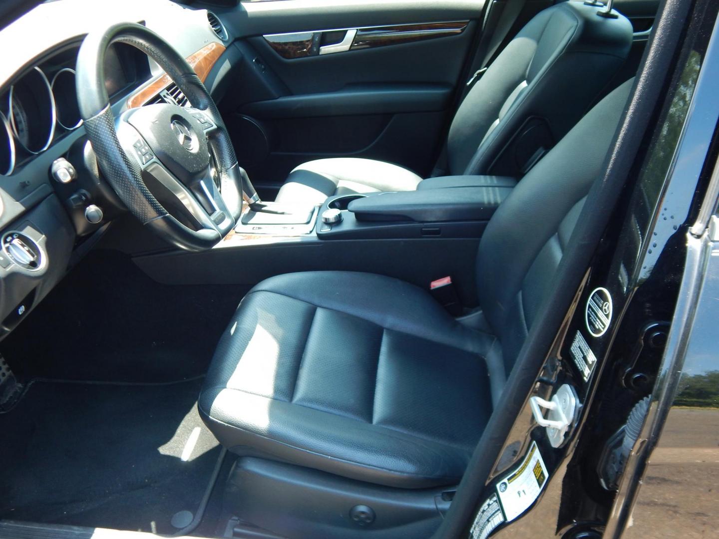 2013 Black /Black Mercedes-Benz C-Class C300 4MATIC Sport Sedan (WDDGF8AB1DG) with an 3.5L V6 engine, 7-Speed Automatic transmission, located at 6528 Lower York Road, New Hope, PA, 18938, (215) 862-9555, 40.358707, -74.977882 - Here we have a Mercedes Benz C300 with a 3.5L V6 putting power to all four wheels via a smooth shifting automatic transmission. Options include: black leather, wood trim, dual power seats, dual front heated seats, dual climate control, AM/FM/CD/AUX/BLUETOOTH/AUX radio with navigation and Harman/Kard - Photo#9