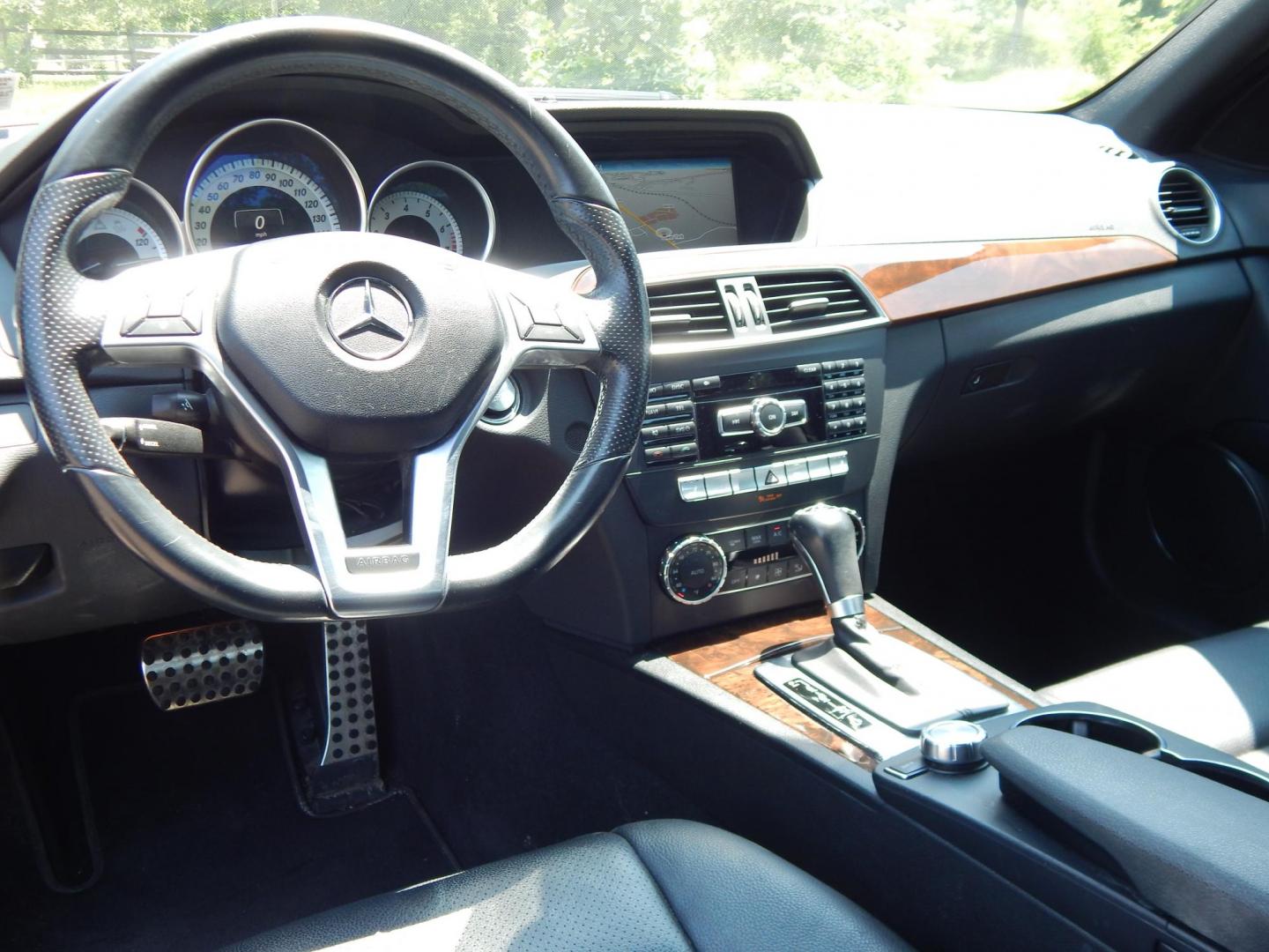 2013 Black /Black Mercedes-Benz C-Class C300 4MATIC Sport Sedan (WDDGF8AB1DG) with an 3.5L V6 engine, 7-Speed Automatic transmission, located at 6528 Lower York Road, New Hope, PA, 18938, (215) 862-9555, 40.358707, -74.977882 - Here we have a Mercedes Benz C300 with a 3.5L V6 putting power to all four wheels via a smooth shifting automatic transmission. Options include: black leather, wood trim, dual power seats, dual front heated seats, dual climate control, AM/FM/CD/AUX/BLUETOOTH/AUX radio with navigation and Harman/Kard - Photo#11