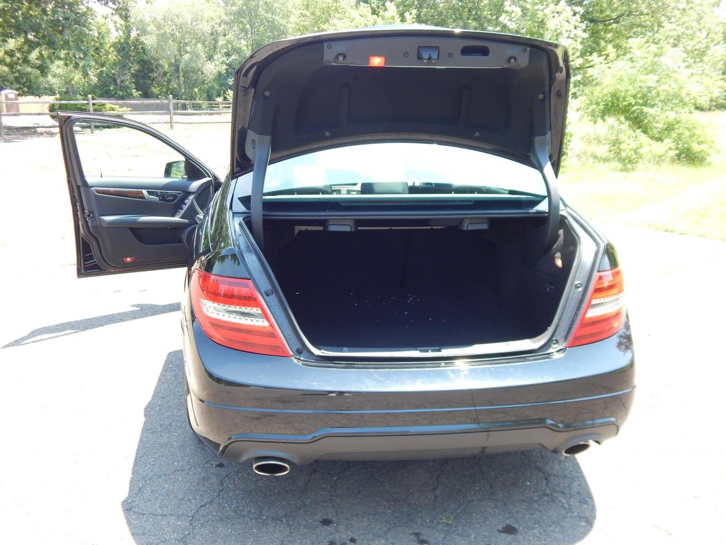 2013 Black /Black Mercedes-Benz C-Class C300 4MATIC Sport Sedan (WDDGF8AB1DG) with an 3.5L V6 engine, 7-Speed Automatic transmission, located at 6528 Lower York Road, New Hope, PA, 18938, (215) 862-9555, 40.358707, -74.977882 - Here we have a Mercedes Benz C300 with a 3.5L V6 putting power to all four wheels via a smooth shifting automatic transmission. Options include: black leather, wood trim, dual power seats, dual front heated seats, dual climate control, AM/FM/CD/AUX/BLUETOOTH/AUX radio with navigation and Harman/Kard - Photo#12