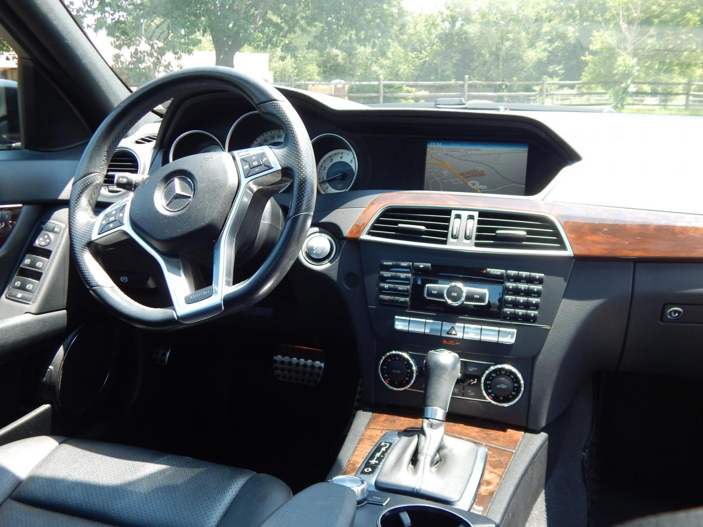 2013 Black /Black Mercedes-Benz C-Class C300 4MATIC Sport Sedan (WDDGF8AB1DG) with an 3.5L V6 engine, 7-Speed Automatic transmission, located at 6528 Lower York Road, New Hope, PA, 18938, (215) 862-9555, 40.358707, -74.977882 - Here we have a Mercedes Benz C300 with a 3.5L V6 putting power to all four wheels via a smooth shifting automatic transmission. Options include: black leather, wood trim, dual power seats, dual front heated seats, dual climate control, AM/FM/CD/AUX/BLUETOOTH/AUX radio with navigation and Harman/Kard - Photo#15