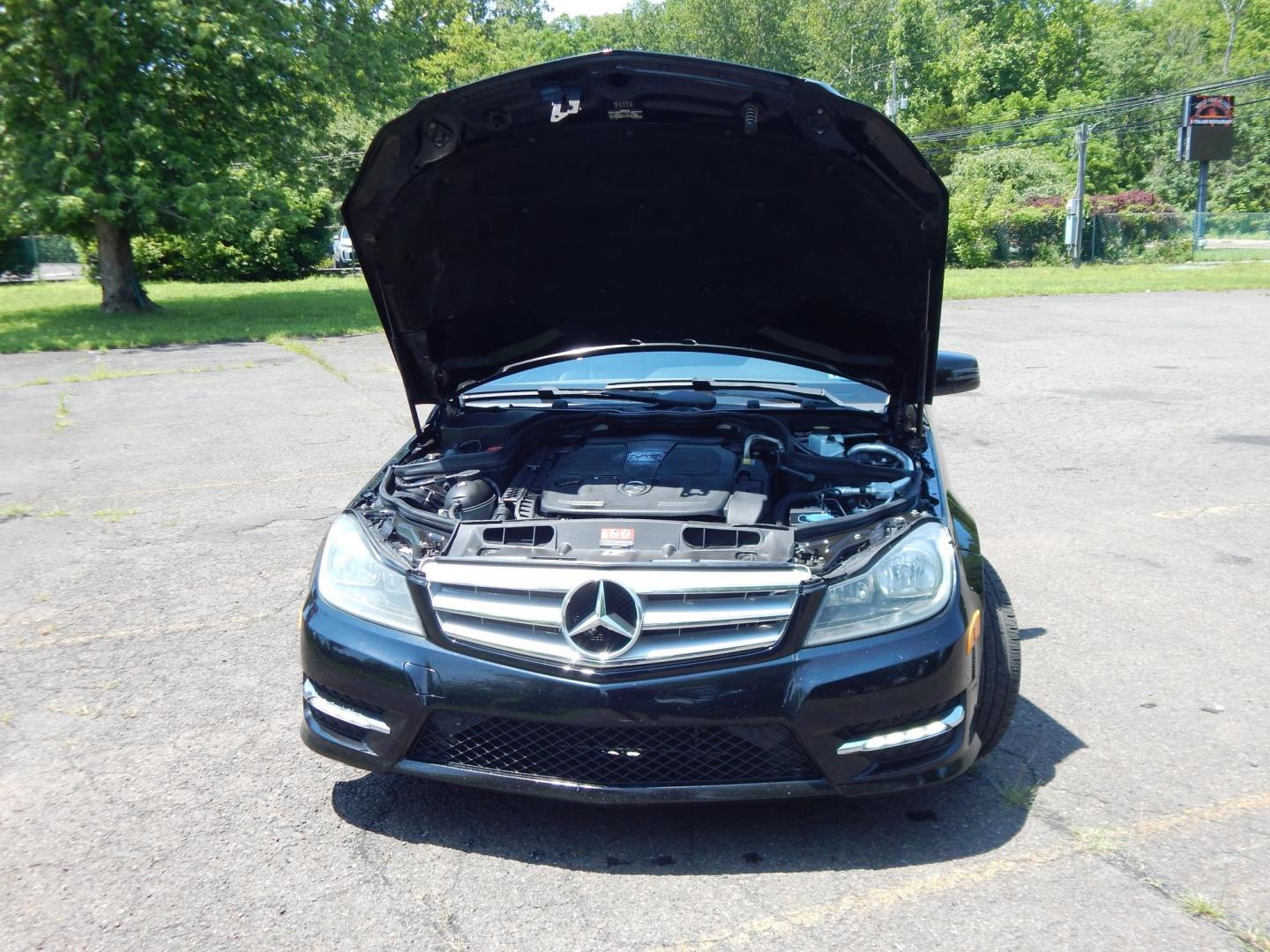 2013 Black /Black Mercedes-Benz C-Class C300 4MATIC Sport Sedan (WDDGF8AB1DG) with an 3.5L V6 engine, 7-Speed Automatic transmission, located at 6528 Lower York Road, New Hope, PA, 18938, (215) 862-9555, 40.358707, -74.977882 - Here we have a Mercedes Benz C300 with a 3.5L V6 putting power to all four wheels via a smooth shifting automatic transmission. Options include: black leather, wood trim, dual power seats, dual front heated seats, dual climate control, AM/FM/CD/AUX/BLUETOOTH/AUX radio with navigation and Harman/Kard - Photo#17