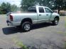 2004 Silver /Gray Dodge Ram 2500 Laramie Quad Cab 4WD (3D7KU28D94G) with an 5.7L V8 OHV 16V engine, Automatic transmission, located at 6528 Lower York Road, New Hope, PA, 18938, (215) 862-9555, 40.358707, -74.977882 - Here we have a 2004 Dodge Ram 2500 with a 5.7L V8 putting power to an automatic 4x4 transmission. Options include: gray cloth, keyless entry, 2 keys and 2 remotes, cruise control, tilt steering wheel, AC, power windows, power locks, power mirrors, AM/FM/CD radio, 6 seats, 17 inch wheels, tow hitch, - Photo#5