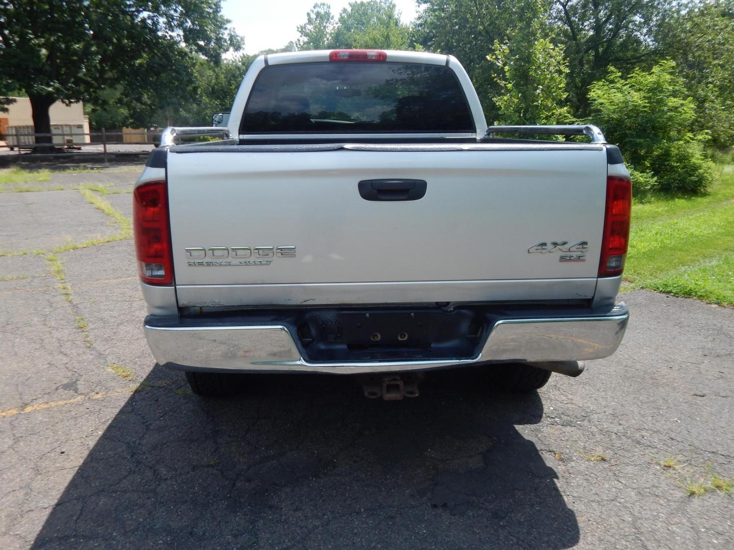 2004 Silver /Gray Dodge Ram 2500 Laramie Quad Cab 4WD (3D7KU28D94G) with an 5.7L V8 OHV 16V engine, Automatic transmission, located at 6528 Lower York Road, New Hope, PA, 18938, (215) 862-9555, 40.358707, -74.977882 - Here we have a 2004 Dodge Ram 2500 with a 5.7L V8 putting power to an automatic 4x4 transmission. Options include: gray cloth, keyless entry, 2 keys and 2 remotes, cruise control, tilt steering wheel, AC, power windows, power locks, power mirrors, AM/FM/CD radio, 6 seats, 17 inch wheels, tow hitch, - Photo#9