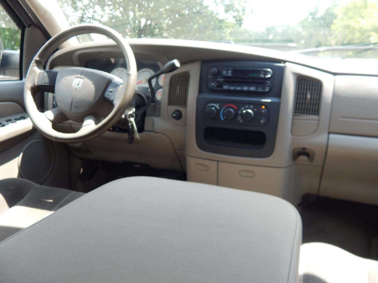 2004 Silver /Gray Dodge Ram 2500 Laramie Quad Cab 4WD (3D7KU28D94G) with an 5.7L V8 OHV 16V engine, Automatic transmission, located at 6528 Lower York Road, New Hope, PA, 18938, (215) 862-9555, 40.358707, -74.977882 - Here we have a 2004 Dodge Ram 2500 with a 5.7L V8 putting power to an automatic 4x4 transmission. Options include: gray cloth, keyless entry, 2 keys and 2 remotes, cruise control, tilt steering wheel, AC, power windows, power locks, power mirrors, AM/FM/CD radio, 6 seats, 17 inch wheels, tow hitch, - Photo#17