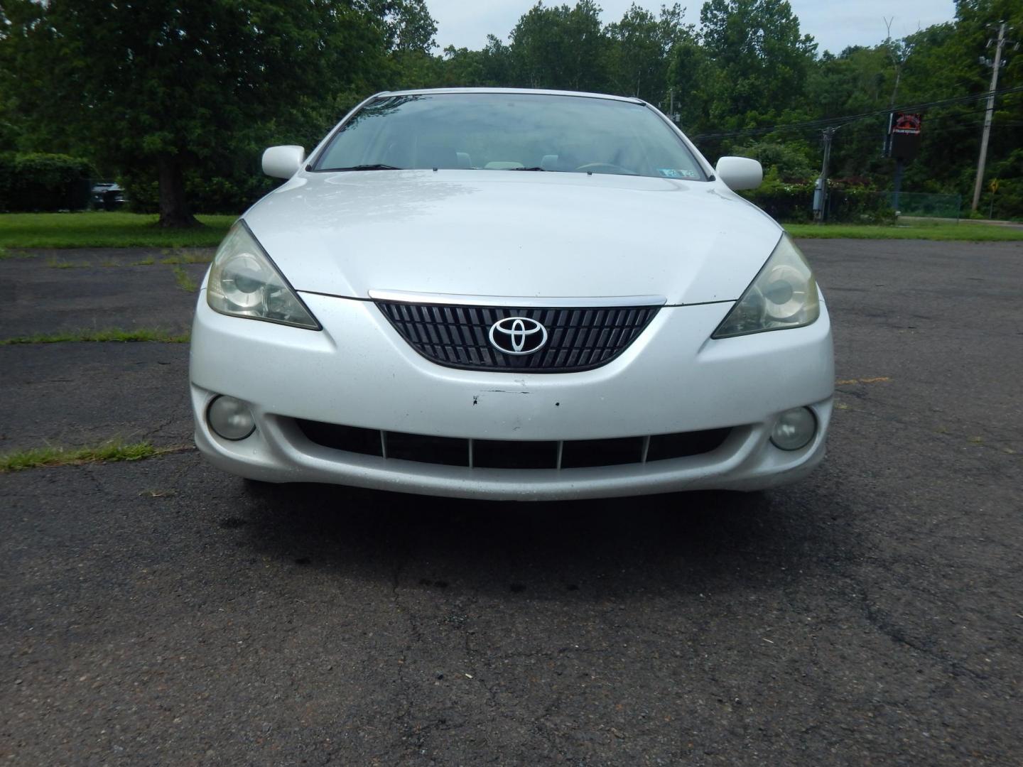 2004 White /Tan Toyota Camry Solara SE (4T1CE38PX4U) with an 2.4L L4 DOHC 24V engine, Automatic transmission, located at 6528 Lower York Road, New Hope, PA, 18938, (215) 862-9555, 40.358707, -74.977882 - Here we have a Toyota Solara with a 2.4L 4 cylinder engine putting power to the front wheels via a smooth shifting automatic transmission. Options include: tan cloth, cold AC, heat, AM/FM/CD radio, cruise control, tilt steering wheel, power windows, power locks, aftermarket alarm system, power mirro - Photo#7