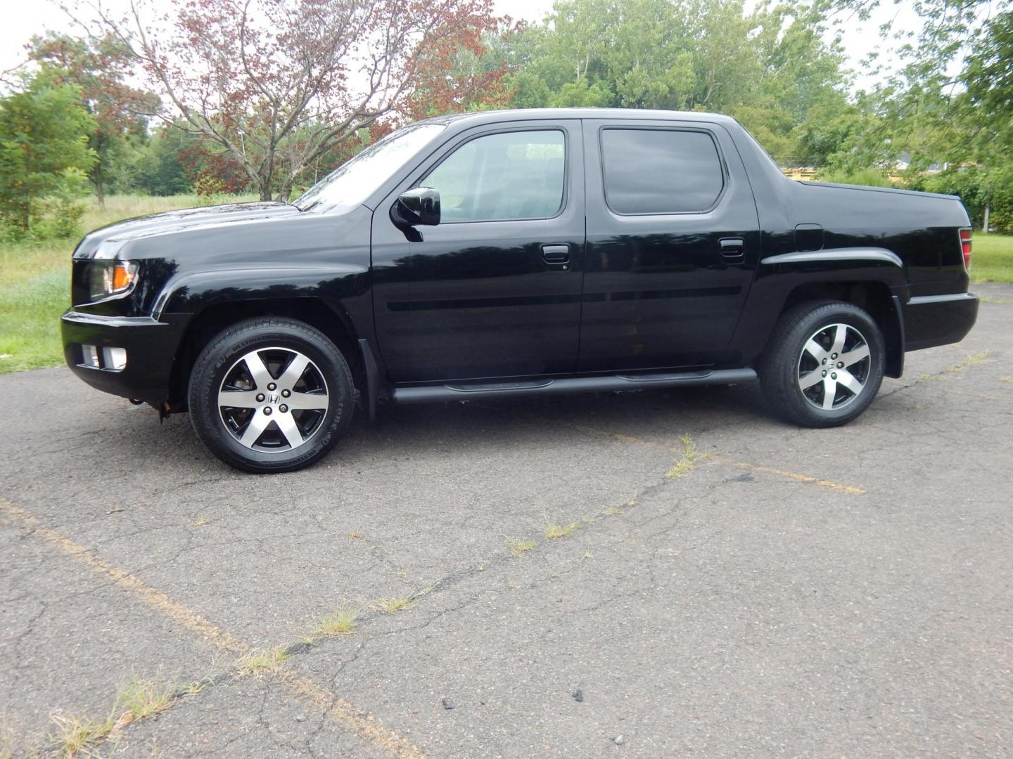 2014 Black /Black Honda Ridgeline SE (5FPYK1F65EB) with an 3.5L V6 SOHC 24V engine, 5-Speed Automatic transmission, located at 6528 Lower York Road, New Hope, PA, 18938, (215) 862-9555, 40.358707, -74.977882 - Here we have a beautifully well kept, ONE OWNER, 20k original miles, 2014 Honda Ridgeline with a 3.5L V6 putting power to the ground via a 4x4 automatic transmission. Options include: black leather, power drivers seat, heated front seats, dual climate controls, AM/FM/CD/AUX/XM radio with navigation, - Photo#1