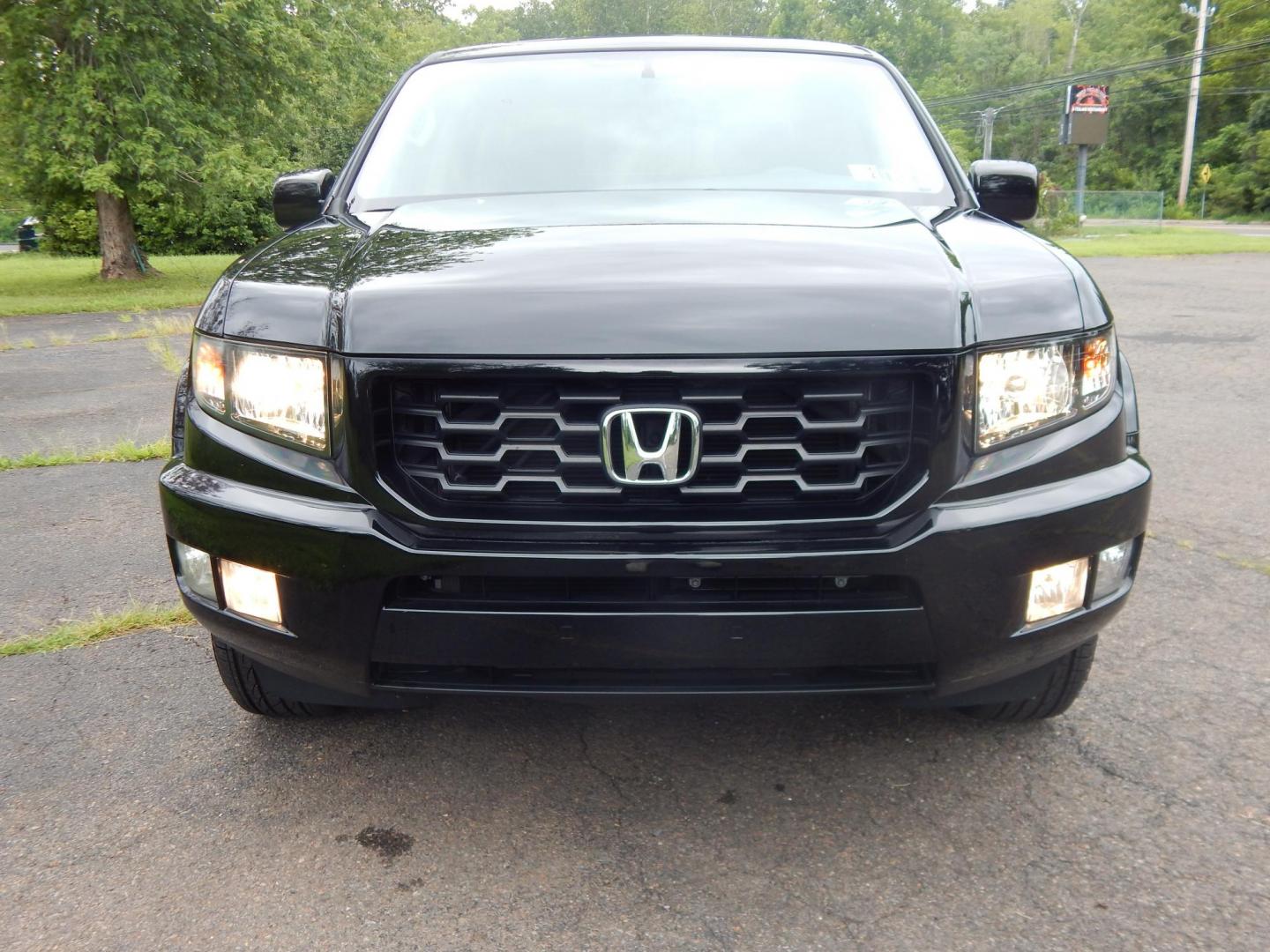 2014 Black /Black Honda Ridgeline SE (5FPYK1F65EB) with an 3.5L V6 SOHC 24V engine, 5-Speed Automatic transmission, located at 6528 Lower York Road, New Hope, PA, 18938, (215) 862-9555, 40.358707, -74.977882 - Here we have a beautifully well kept, ONE OWNER, 20k original miles, 2014 Honda Ridgeline with a 3.5L V6 putting power to the ground via a 4x4 automatic transmission. Options include: black leather, power drivers seat, heated front seats, dual climate controls, AM/FM/CD/AUX/XM radio with navigation, - Photo#8