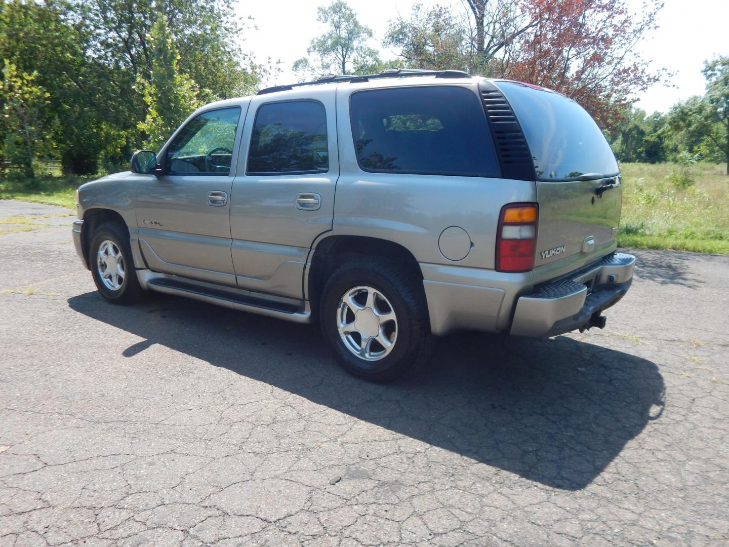 2002 Tan /Gray GMC Yukon Denali Base (1GKEK63U22J) with an 6.0L V8 OHV 16V engine, 4-Speed Automatic Overdrive transmission, located at 6528 Lower York Road, New Hope, PA, 18938, (215) 862-9555, 40.358707, -74.977882 - Here we have a 2002 GMC Yukon Denali with a 6.0L V8 putting power to an AWD automatic transmission. Options include: gray leather, power seats, heated seats front and middle row, 3 row seating, heat, A/C, rear climate controls, AM/FM/CD/TAPE radio, tilt steering wheel, rear windshield wiper, power w - Photo#2