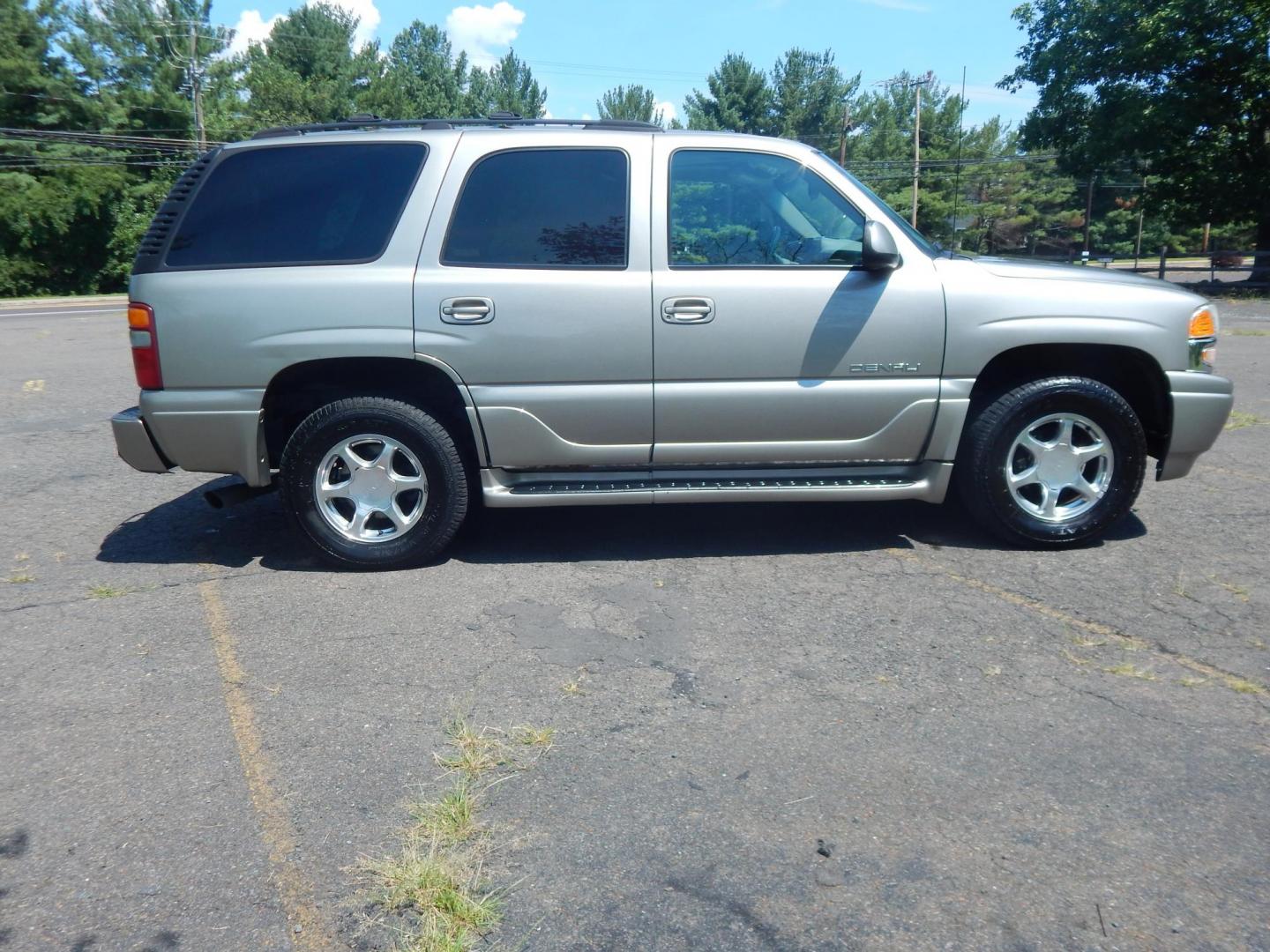 2002 Tan /Gray GMC Yukon Denali Base (1GKEK63U22J) with an 6.0L V8 OHV 16V engine, 4-Speed Automatic Overdrive transmission, located at 6528 Lower York Road, New Hope, PA, 18938, (215) 862-9555, 40.358707, -74.977882 - Here we have a 2002 GMC Yukon Denali with a 6.0L V8 putting power to an AWD automatic transmission. Options include: gray leather, power seats, heated seats front and middle row, 3 row seating, heat, A/C, rear climate controls, AM/FM/CD/TAPE radio, tilt steering wheel, rear windshield wiper, power w - Photo#4