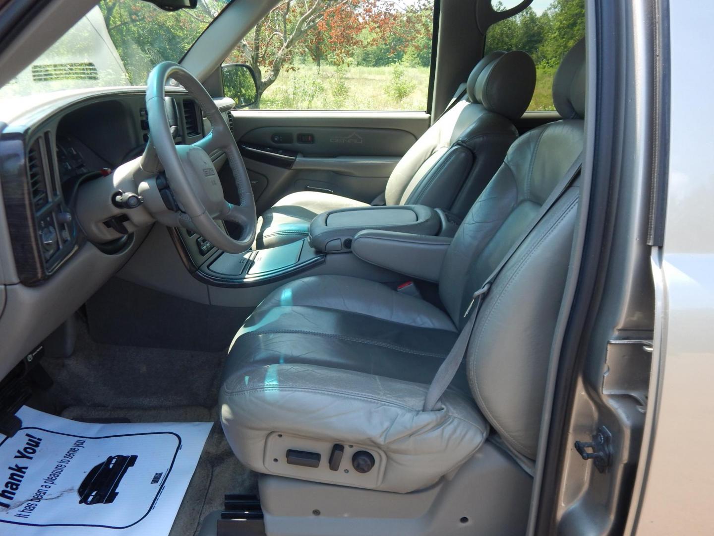 2002 Tan /Gray GMC Yukon Denali Base (1GKEK63U22J) with an 6.0L V8 OHV 16V engine, 4-Speed Automatic Overdrive transmission, located at 6528 Lower York Road, New Hope, PA, 18938, (215) 862-9555, 40.358707, -74.977882 - Here we have a 2002 GMC Yukon Denali with a 6.0L V8 putting power to an AWD automatic transmission. Options include: gray leather, power seats, heated seats front and middle row, 3 row seating, heat, A/C, rear climate controls, AM/FM/CD/TAPE radio, tilt steering wheel, rear windshield wiper, power w - Photo#11