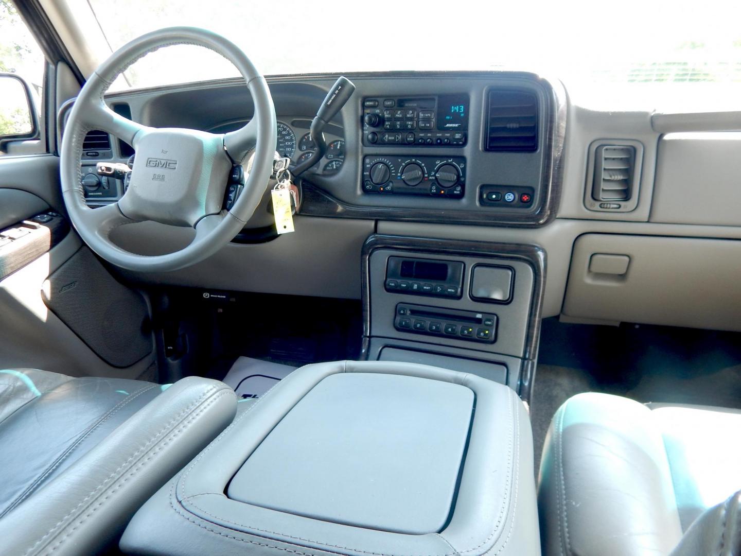 2002 Tan /Gray GMC Yukon Denali Base (1GKEK63U22J) with an 6.0L V8 OHV 16V engine, 4-Speed Automatic Overdrive transmission, located at 6528 Lower York Road, New Hope, PA, 18938, (215) 862-9555, 40.358707, -74.977882 - Here we have a 2002 GMC Yukon Denali with a 6.0L V8 putting power to an AWD automatic transmission. Options include: gray leather, power seats, heated seats front and middle row, 3 row seating, heat, A/C, rear climate controls, AM/FM/CD/TAPE radio, tilt steering wheel, rear windshield wiper, power w - Photo#16