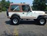 1983 White /Tan Jeep CJ7 Base (1JCCN87E0DT) with an 4.2L L6 OHV engine, Manual transmission, located at 6528 Lower York Road, New Hope, PA, 18938, (215) 862-9555, 40.358707, -74.977882 - Here we have a 1983 CJ-7 Laredo with a 4.2L straight six putting power to an 4x4 manual transmission. This CJ has saddle colored leather seats, sliding windows, hard top, lockers on both axles, new muffler, new bearings and 15 inch alloy wheels with 4 Mickey Thompson tires. This vehicle is being off - Photo#4