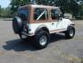 1983 White /Tan Jeep CJ7 Base (1JCCN87E0DT) with an 4.2L L6 OHV engine, Manual transmission, located at 6528 Lower York Road, New Hope, PA, 18938, (215) 862-9555, 40.358707, -74.977882 - Here we have a 1983 CJ-7 Laredo with a 4.2L straight six putting power to an 4x4 manual transmission. This CJ has saddle colored leather seats, sliding windows, hard top, lockers on both axles, new muffler, new bearings and 15 inch alloy wheels with 4 Mickey Thompson tires. This vehicle is being off - Photo#3