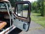 1983 White /Tan Jeep CJ7 Base (1JCCN87E0DT) with an 4.2L L6 OHV engine, Manual transmission, located at 6528 Lower York Road, New Hope, PA, 18938, (215) 862-9555, 40.358707, -74.977882 - Here we have a 1983 CJ-7 Laredo with a 4.2L straight six putting power to an 4x4 manual transmission. This CJ has saddle colored leather seats, sliding windows, hard top, lockers on both axles, new muffler, new bearings and 15 inch alloy wheels with 4 Mickey Thompson tires. This vehicle is being off - Photo#10