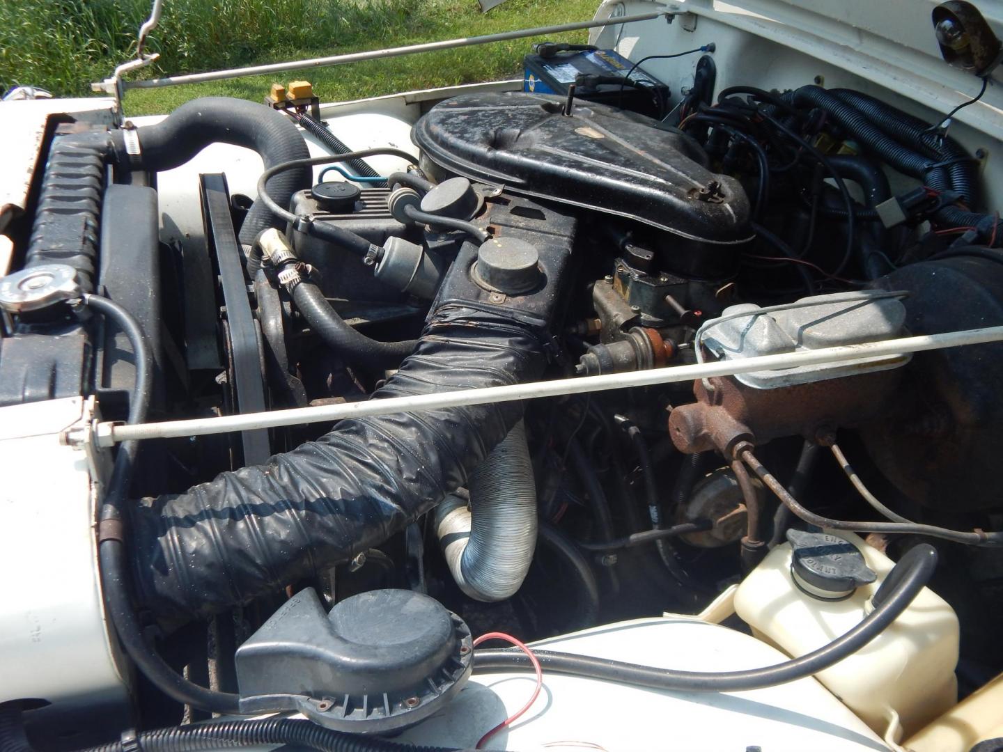 1983 White /Tan Jeep CJ7 Base (1JCCN87E0DT) with an 4.2L L6 OHV engine, Manual transmission, located at 6528 Lower York Road, New Hope, PA, 18938, (215) 862-9555, 40.358707, -74.977882 - Here we have a 1983 CJ-7 Laredo with a 4.2L straight six putting power to an 4x4 manual transmission. This CJ has saddle colored leather seats, sliding windows, hard top, lockers on both axles, new muffler, new bearings and 15 inch alloy wheels with 4 Mickey Thompson tires. This vehicle is being off - Photo#15