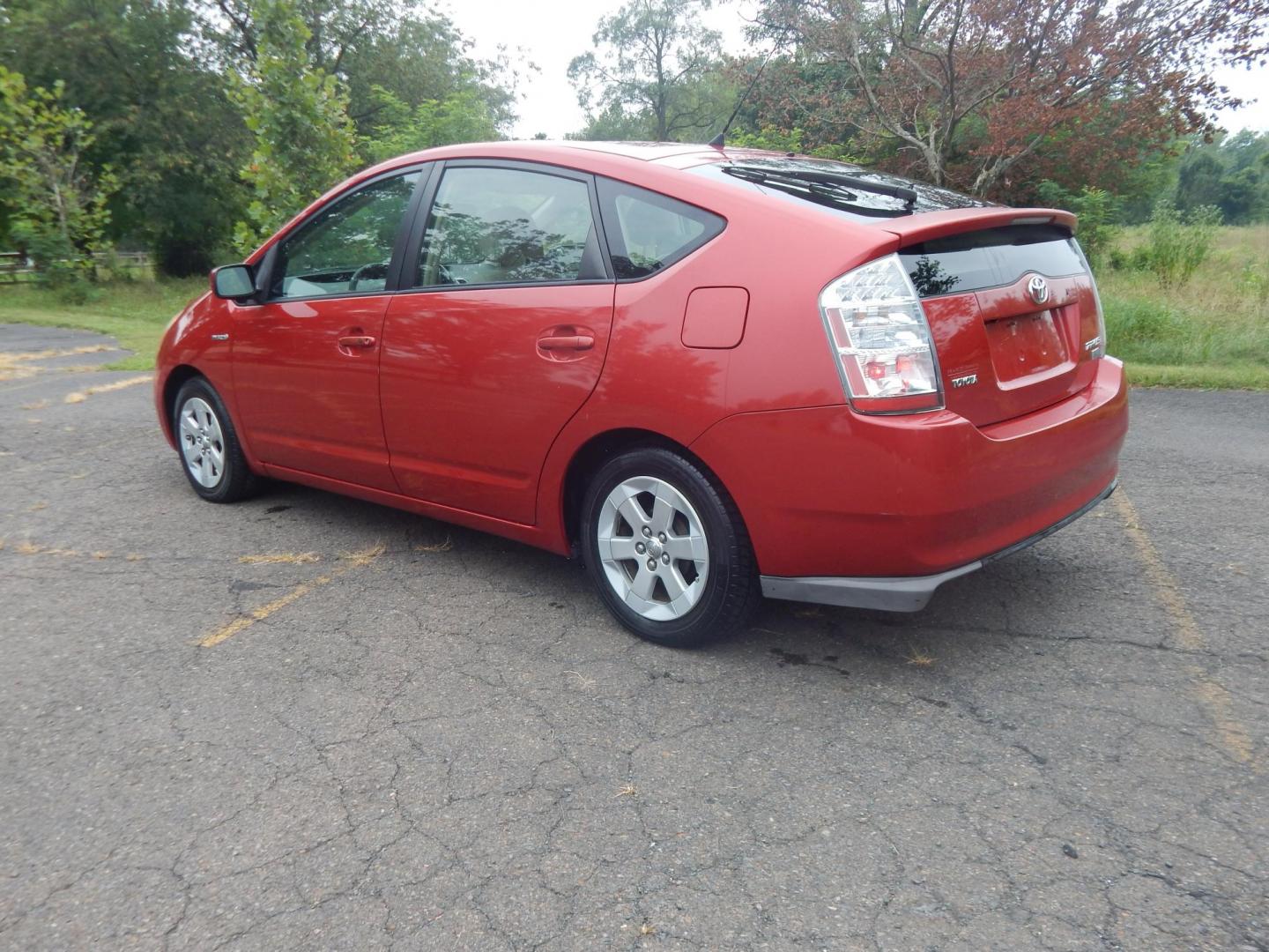 2007 Red /Tan Toyota Prius 4-Door Liftback (JTDKB20UX77) with an 1.5L L4 DOHC 16V HYBRID engine, Automatic CVT Overdrive transmission, located at 6528 Lower York Road, New Hope, PA, 18938, (215) 862-9555, 40.358707, -74.977882 - Here we have a 2007 Toyota Prius with a 1.5L 4 cylinder hybrid engine putting power to the front wheels via an automatic transmission. Options include: tan cloth seats, manual sliding seats, AM/FM/CD/AUX radio, cold AC, heat, cruise control, front and rear windshield defrost, tilt steering wheel, po - Photo#2