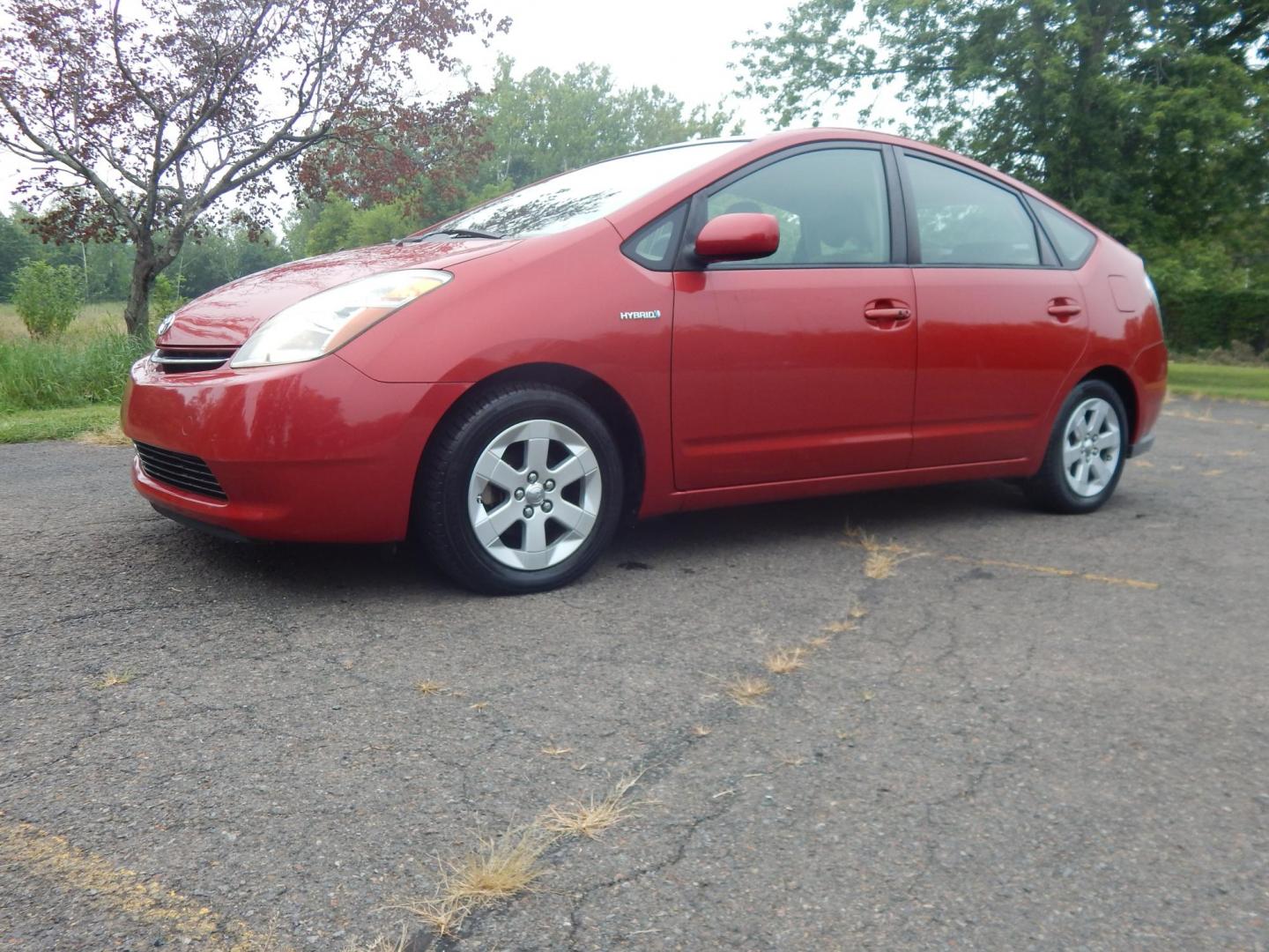 2007 Red /Tan Toyota Prius 4-Door Liftback (JTDKB20UX77) with an 1.5L L4 DOHC 16V HYBRID engine, Automatic CVT Overdrive transmission, located at 6528 Lower York Road, New Hope, PA, 18938, (215) 862-9555, 40.358707, -74.977882 - Here we have a 2007 Toyota Prius with a 1.5L 4 cylinder hybrid engine putting power to the front wheels via an automatic transmission. Options include: tan cloth seats, manual sliding seats, AM/FM/CD/AUX radio, cold AC, heat, cruise control, front and rear windshield defrost, tilt steering wheel, po - Photo#0