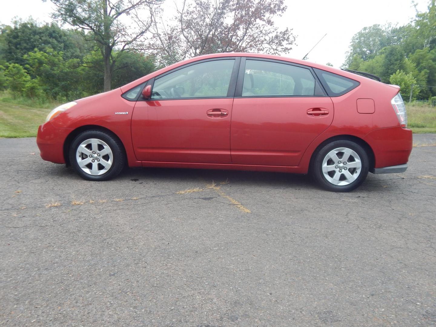 2007 Red /Tan Toyota Prius 4-Door Liftback (JTDKB20UX77) with an 1.5L L4 DOHC 16V HYBRID engine, Automatic CVT Overdrive transmission, located at 6528 Lower York Road, New Hope, PA, 18938, (215) 862-9555, 40.358707, -74.977882 - Here we have a 2007 Toyota Prius with a 1.5L 4 cylinder hybrid engine putting power to the front wheels via an automatic transmission. Options include: tan cloth seats, manual sliding seats, AM/FM/CD/AUX radio, cold AC, heat, cruise control, front and rear windshield defrost, tilt steering wheel, po - Photo#1