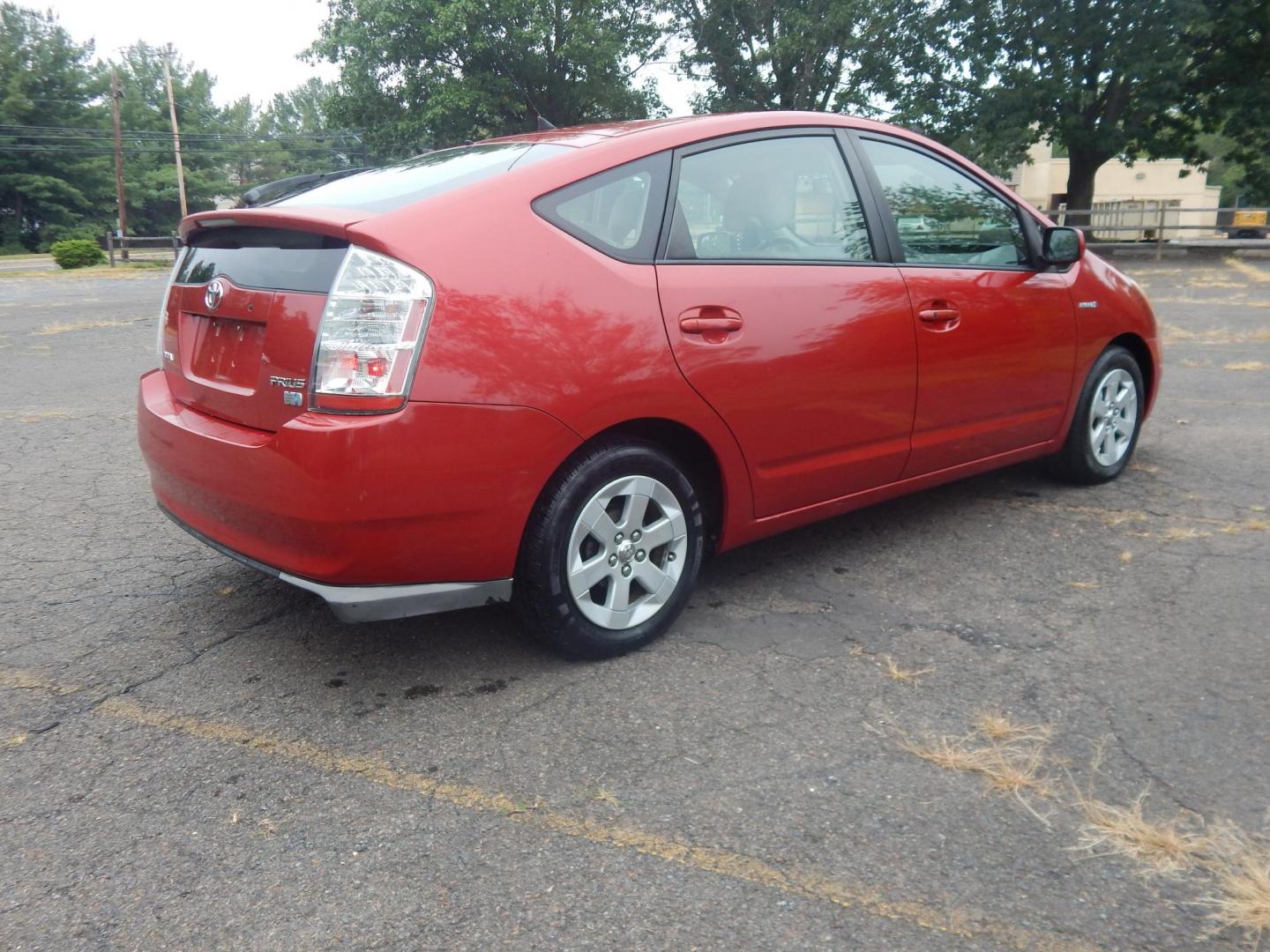 2007 Red /Tan Toyota Prius 4-Door Liftback (JTDKB20UX77) with an 1.5L L4 DOHC 16V HYBRID engine, Automatic CVT Overdrive transmission, located at 6528 Lower York Road, New Hope, PA, 18938, (215) 862-9555, 40.358707, -74.977882 - Here we have a 2007 Toyota Prius with a 1.5L 4 cylinder hybrid engine putting power to the front wheels via an automatic transmission. Options include: tan cloth seats, manual sliding seats, AM/FM/CD/AUX radio, cold AC, heat, cruise control, front and rear windshield defrost, tilt steering wheel, po - Photo#3