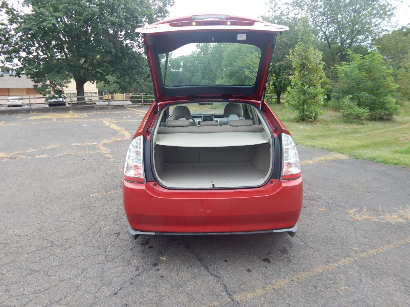 2007 Red /Tan Toyota Prius 4-Door Liftback (JTDKB20UX77) with an 1.5L L4 DOHC 16V HYBRID engine, Automatic CVT Overdrive transmission, located at 6528 Lower York Road, New Hope, PA, 18938, (215) 862-9555, 40.358707, -74.977882 - Here we have a 2007 Toyota Prius with a 1.5L 4 cylinder hybrid engine putting power to the front wheels via an automatic transmission. Options include: tan cloth seats, manual sliding seats, AM/FM/CD/AUX radio, cold AC, heat, cruise control, front and rear windshield defrost, tilt steering wheel, po - Photo#8