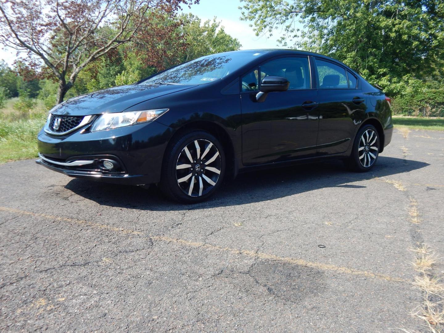 2015 Black /Black Honda Civic EX-L Sedan CVT (19XFB2F9XFE) with an 1.8L L4 SOHC 16V engine, Continuously Variable Transmission transmission, located at 6528 Lower York Road, New Hope, PA, 18938, (215) 862-9555, 40.358707, -74.977882 - Here we have a 2015 Honda Civic with a 1.8L 4 cylinder engine putting power to the front wheels via an automatic CVT transmission. Options include: black leather, power drivers seat, front heated seats, cold AC, heat, sunroof, front and rear defrost, AM/FM/CD/BLUETOOTH radio, back up camera, passeng - Photo#0