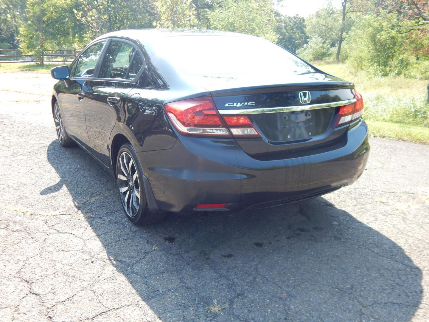 2015 Black /Black Honda Civic EX-L Sedan CVT (19XFB2F9XFE) with an 1.8L L4 SOHC 16V engine, Continuously Variable Transmission transmission, located at 6528 Lower York Road, New Hope, PA, 18938, (215) 862-9555, 40.358707, -74.977882 - Here we have a 2015 Honda Civic with a 1.8L 4 cylinder engine putting power to the front wheels via an automatic CVT transmission. Options include: black leather, power drivers seat, front heated seats, cold AC, heat, sunroof, front and rear defrost, AM/FM/CD/BLUETOOTH radio, back up camera, passeng - Photo#3