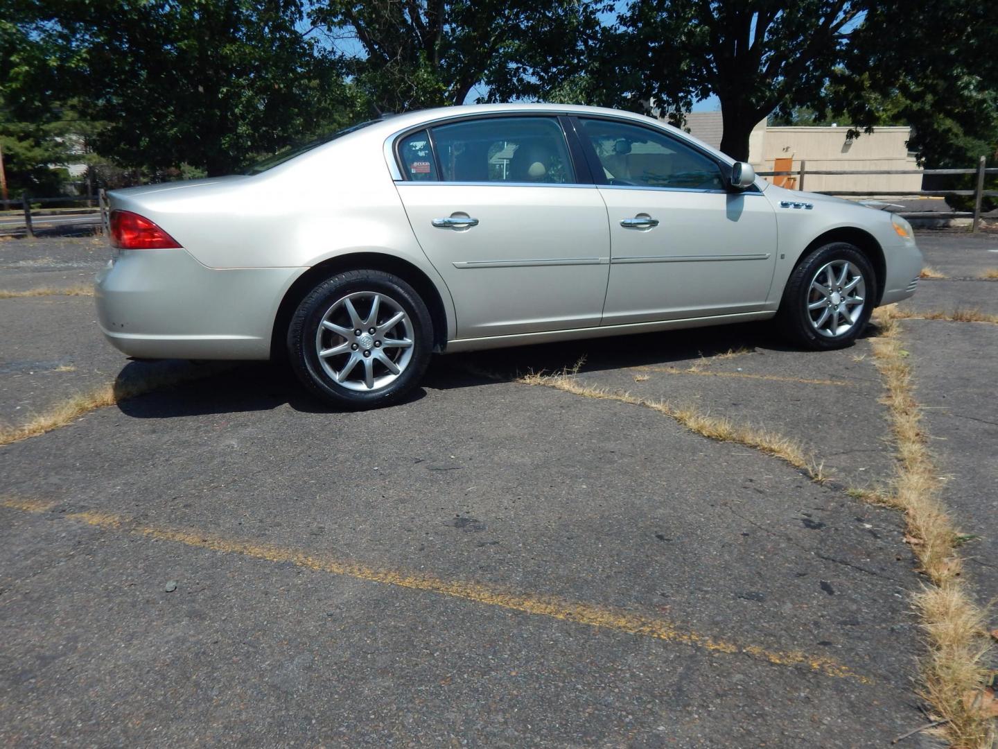 2007 Tan /Tan Buick Lucerne CXL V6 (1G4HD57207U) with an 3.8L V6 OHV 12V engine, 4-Speed Automatic Overdrive transmission, located at 6528 Lower York Road, New Hope, PA, 18938, (215) 862-9555, 40.358707, -74.977882 - Here we have a RECONSTRUCTED TITLE 2007 Buick Lucerne with the very popular 3.8L V6 putting power to the front wheels via an automatic transmission. Options include: tan leather, wood trim, power sliding drivers seat, dual climate controls, AM/FM/CD/AUX radio, cruise control, tilt steering wheel, au - Photo#4