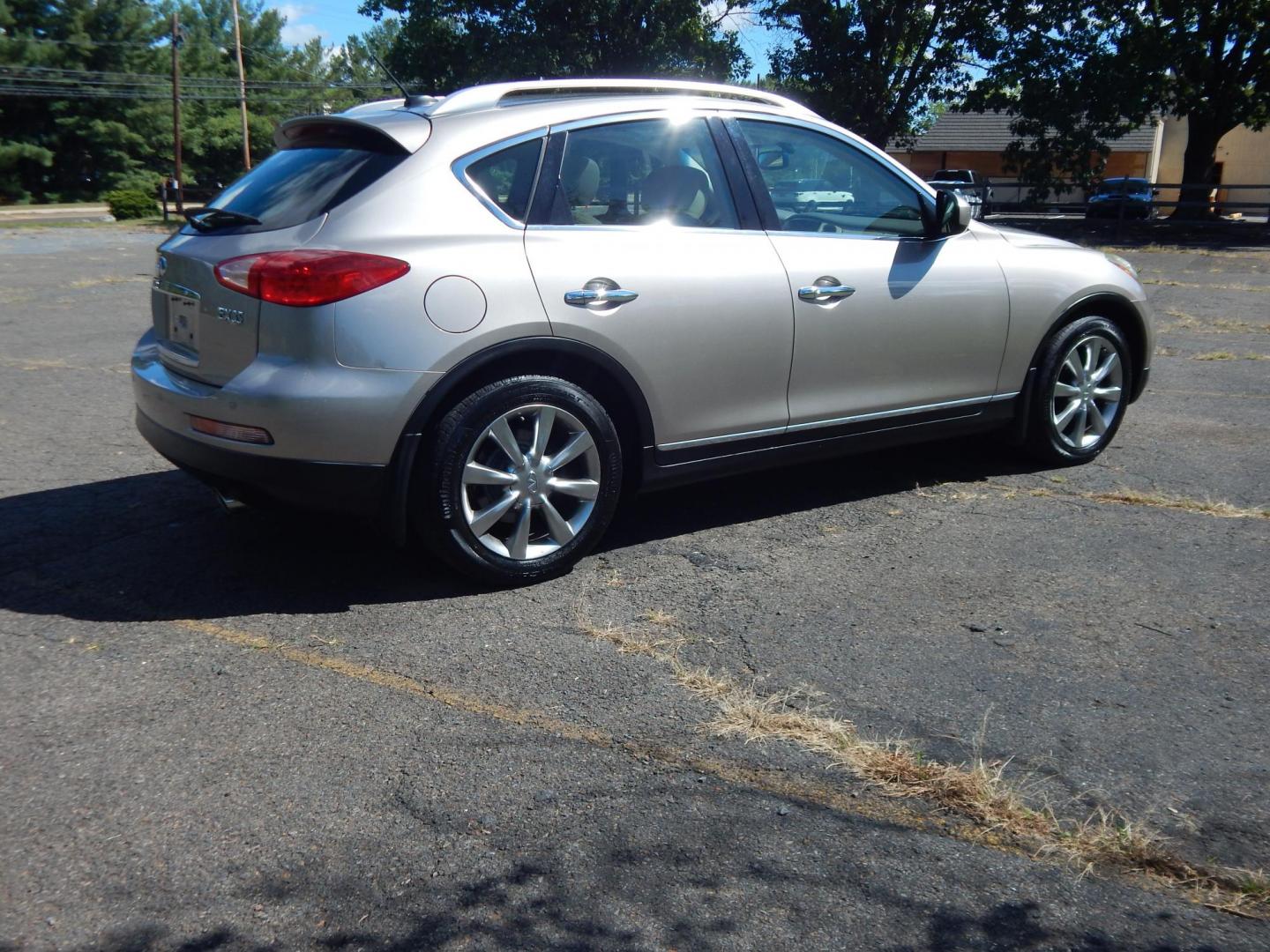 2008 Silver /Tan Infiniti EX EX35 AWD (JNKAJ09F18M) with an 3.5L V6 DOHC 24V engine, 5-Speed Automatic Overdrive transmission, located at 6528 Lower York Road, New Hope, PA, 18938, (215) 862-9555, 40.358707, -74.977882 - Here we have a very clean, Infiniti EX35 with a 3.5L V6 putting power to the ground via a smooth shifting AWD automatic transmission. Options include: beige paint, tan leather, wood trim, dual power seats, heated front seats, power sunroof, power folding rear seats, dual climate controls, push butto - Photo#5