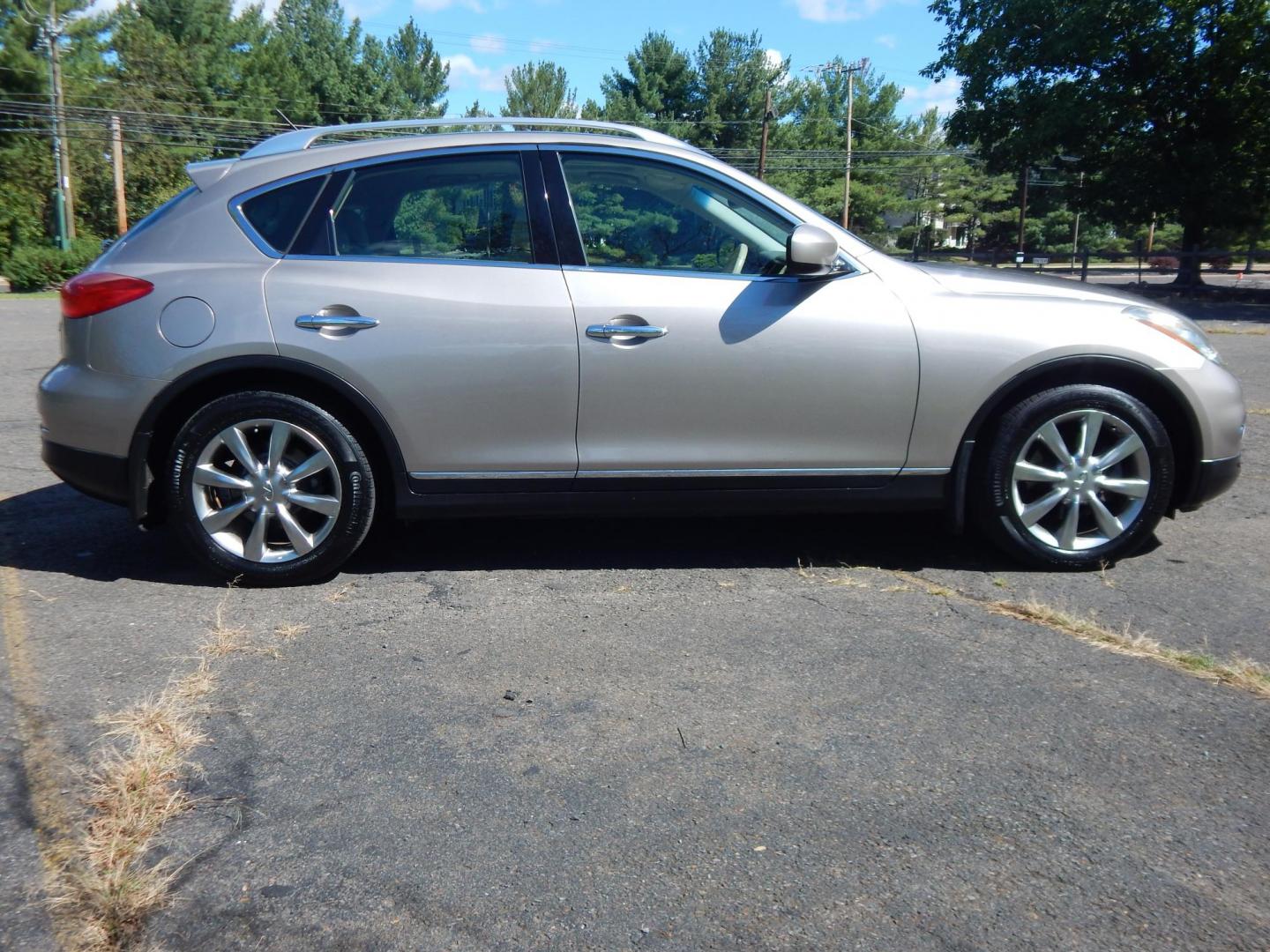 2008 Silver /Tan Infiniti EX EX35 AWD (JNKAJ09F18M) with an 3.5L V6 DOHC 24V engine, 5-Speed Automatic Overdrive transmission, located at 6528 Lower York Road, New Hope, PA, 18938, (215) 862-9555, 40.358707, -74.977882 - Here we have a very clean, Infiniti EX35 with a 3.5L V6 putting power to the ground via a smooth shifting AWD automatic transmission. Options include: beige paint, tan leather, wood trim, dual power seats, heated front seats, power sunroof, power folding rear seats, dual climate controls, push butto - Photo#6