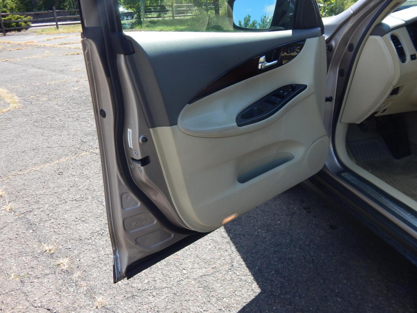 2008 Silver /Tan Infiniti EX EX35 AWD (JNKAJ09F18M) with an 3.5L V6 DOHC 24V engine, 5-Speed Automatic Overdrive transmission, located at 6528 Lower York Road, New Hope, PA, 18938, (215) 862-9555, 40.358707, -74.977882 - Here we have a very clean, Infiniti EX35 with a 3.5L V6 putting power to the ground via a smooth shifting AWD automatic transmission. Options include: beige paint, tan leather, wood trim, dual power seats, heated front seats, power sunroof, power folding rear seats, dual climate controls, push butto - Photo#11