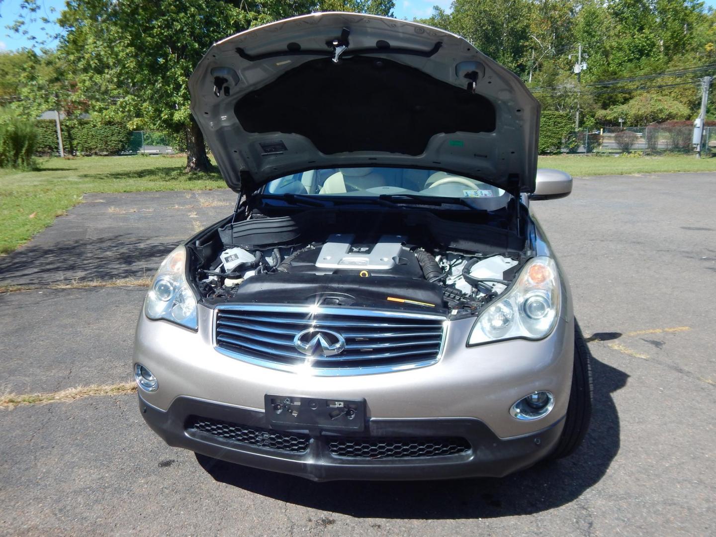 2008 Silver /Tan Infiniti EX EX35 AWD (JNKAJ09F18M) with an 3.5L V6 DOHC 24V engine, 5-Speed Automatic Overdrive transmission, located at 6528 Lower York Road, New Hope, PA, 18938, (215) 862-9555, 40.358707, -74.977882 - Here we have a very clean, Infiniti EX35 with a 3.5L V6 putting power to the ground via a smooth shifting AWD automatic transmission. Options include: beige paint, tan leather, wood trim, dual power seats, heated front seats, power sunroof, power folding rear seats, dual climate controls, push butto - Photo#20