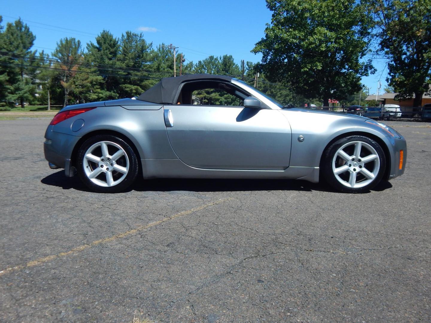 2004 Silver /Tan Nissan 350Z Enthusiast Roadster (JN1AZ36A14M) with an 3.5L V6 DOHC 24V engine, 6-Speed Manual Overdrive transmission, located at 6528 Lower York Road, New Hope, PA, 18938, (215) 862-9555, 40.358707, -74.977882 - Here we have a very fun to drive, Convertible Nissan 350z with a 3.5L V6 putting power to the rear wheels via a smooth shifting automatic transmission. Options include: tan leather sport seats, power seats, power convertible top, heat, A/C, AM/FM/CD/TAPE radio, navigation, tilt steering wheel, power - Photo#7