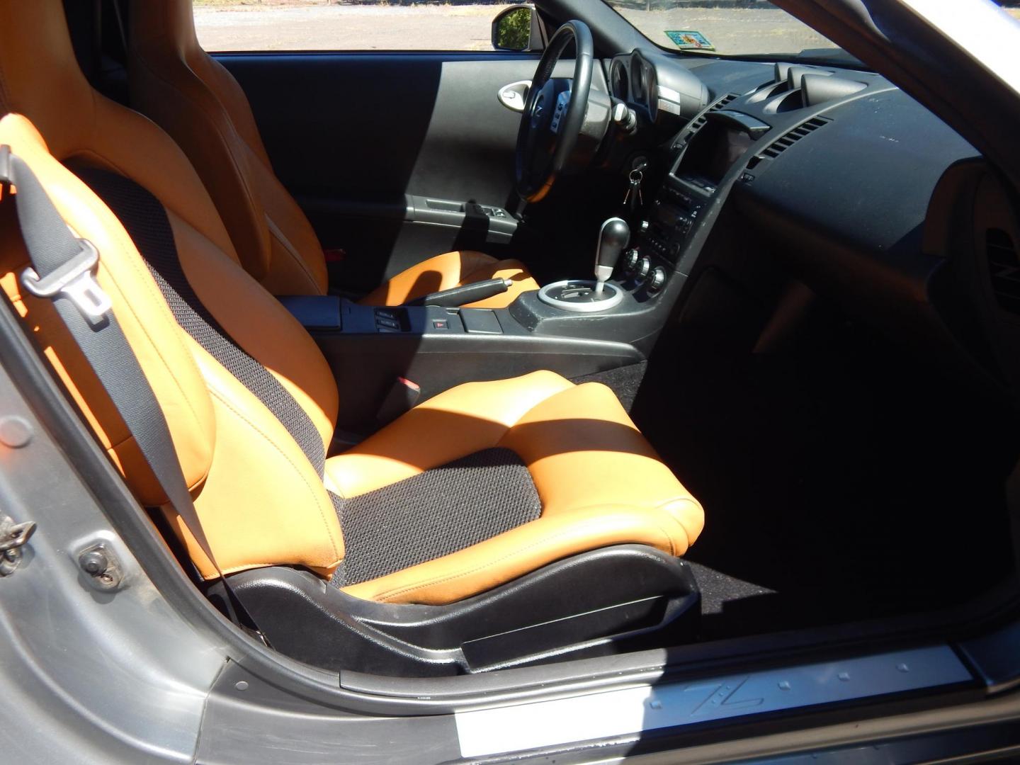 2004 Silver /Tan Nissan 350Z Enthusiast Roadster (JN1AZ36A14M) with an 3.5L V6 DOHC 24V engine, 6-Speed Manual Overdrive transmission, located at 6528 Lower York Road, New Hope, PA, 18938, (215) 862-9555, 40.358707, -74.977882 - Here we have a very fun to drive, Convertible Nissan 350z with a 3.5L V6 putting power to the rear wheels via a smooth shifting automatic transmission. Options include: tan leather sport seats, power seats, power convertible top, heat, A/C, AM/FM/CD/TAPE radio, navigation, tilt steering wheel, power - Photo#14