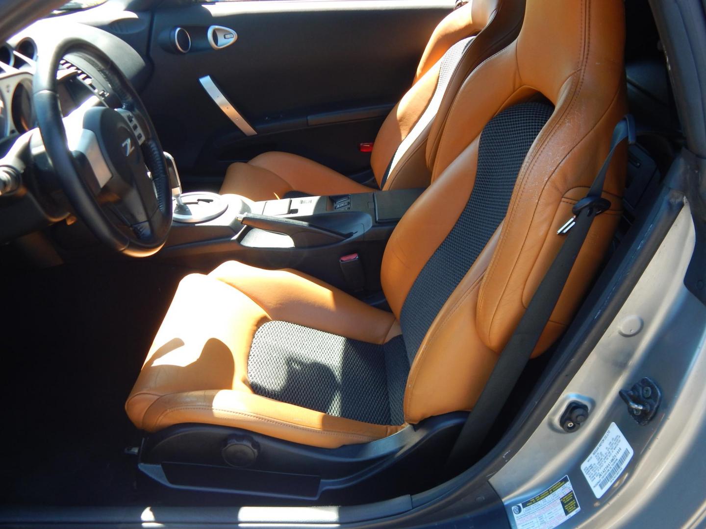2004 Silver /Tan Nissan 350Z Enthusiast Roadster (JN1AZ36A14M) with an 3.5L V6 DOHC 24V engine, 6-Speed Manual Overdrive transmission, located at 6528 Lower York Road, New Hope, PA, 18938, (215) 862-9555, 40.358707, -74.977882 - Here we have a very fun to drive, Convertible Nissan 350z with a 3.5L V6 putting power to the rear wheels via a smooth shifting automatic transmission. Options include: tan leather sport seats, power seats, power convertible top, heat, A/C, AM/FM/CD/TAPE radio, navigation, tilt steering wheel, power - Photo#12