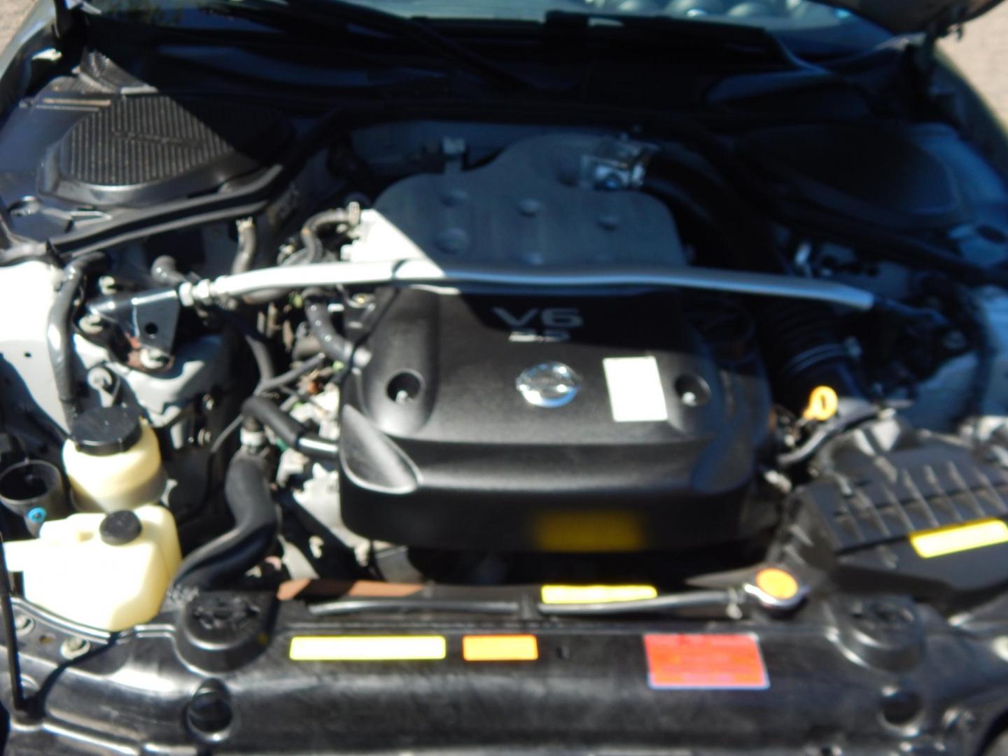 2004 Silver /Tan Nissan 350Z Enthusiast Roadster (JN1AZ36A14M) with an 3.5L V6 DOHC 24V engine, 6-Speed Manual Overdrive transmission, located at 6528 Lower York Road, New Hope, PA, 18938, (215) 862-9555, 40.358707, -74.977882 - Here we have a very fun to drive, Convertible Nissan 350z with a 3.5L V6 putting power to the rear wheels via a smooth shifting automatic transmission. Options include: tan leather sport seats, power seats, power convertible top, heat, A/C, AM/FM/CD/TAPE radio, navigation, tilt steering wheel, power - Photo#15