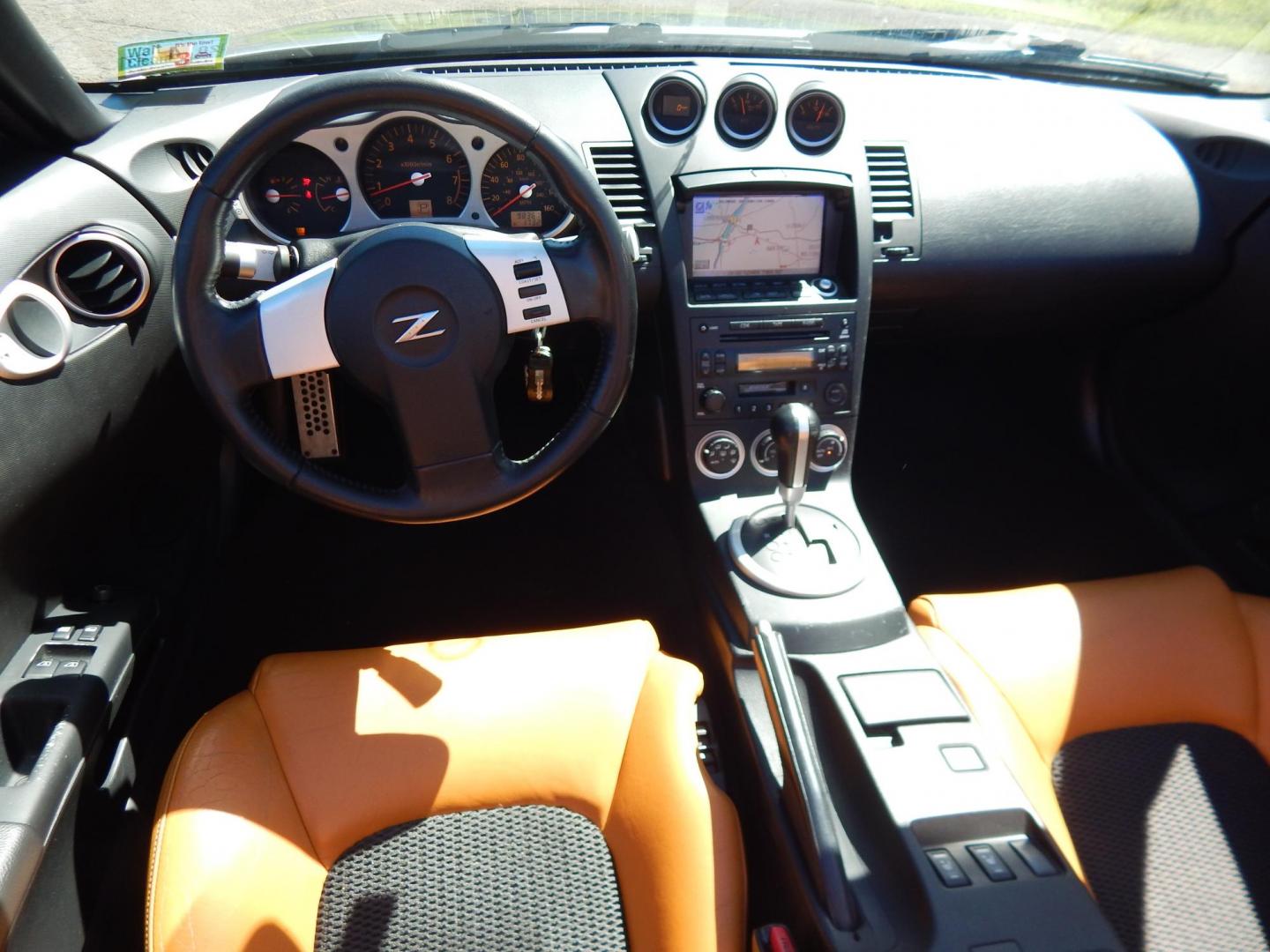 2004 Silver /Tan Nissan 350Z Enthusiast Roadster (JN1AZ36A14M) with an 3.5L V6 DOHC 24V engine, 6-Speed Manual Overdrive transmission, located at 6528 Lower York Road, New Hope, PA, 18938, (215) 862-9555, 40.358707, -74.977882 - Here we have a very fun to drive, Convertible Nissan 350z with a 3.5L V6 putting power to the rear wheels via a smooth shifting automatic transmission. Options include: tan leather sport seats, power seats, power convertible top, heat, A/C, AM/FM/CD/TAPE radio, navigation, tilt steering wheel, power - Photo#23