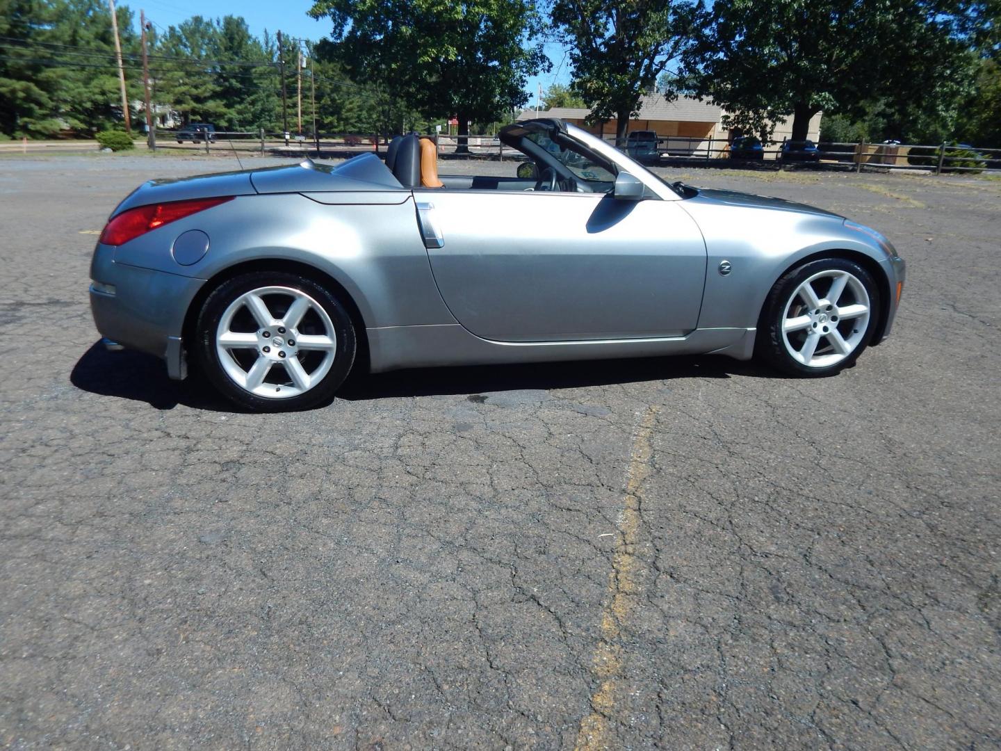 2004 Silver /Tan Nissan 350Z Enthusiast Roadster (JN1AZ36A14M) with an 3.5L V6 DOHC 24V engine, 6-Speed Manual Overdrive transmission, located at 6528 Lower York Road, New Hope, PA, 18938, (215) 862-9555, 40.358707, -74.977882 - Here we have a very fun to drive, Convertible Nissan 350z with a 3.5L V6 putting power to the rear wheels via a smooth shifting automatic transmission. Options include: tan leather sport seats, power seats, power convertible top, heat, A/C, AM/FM/CD/TAPE radio, navigation, tilt steering wheel, power - Photo#6