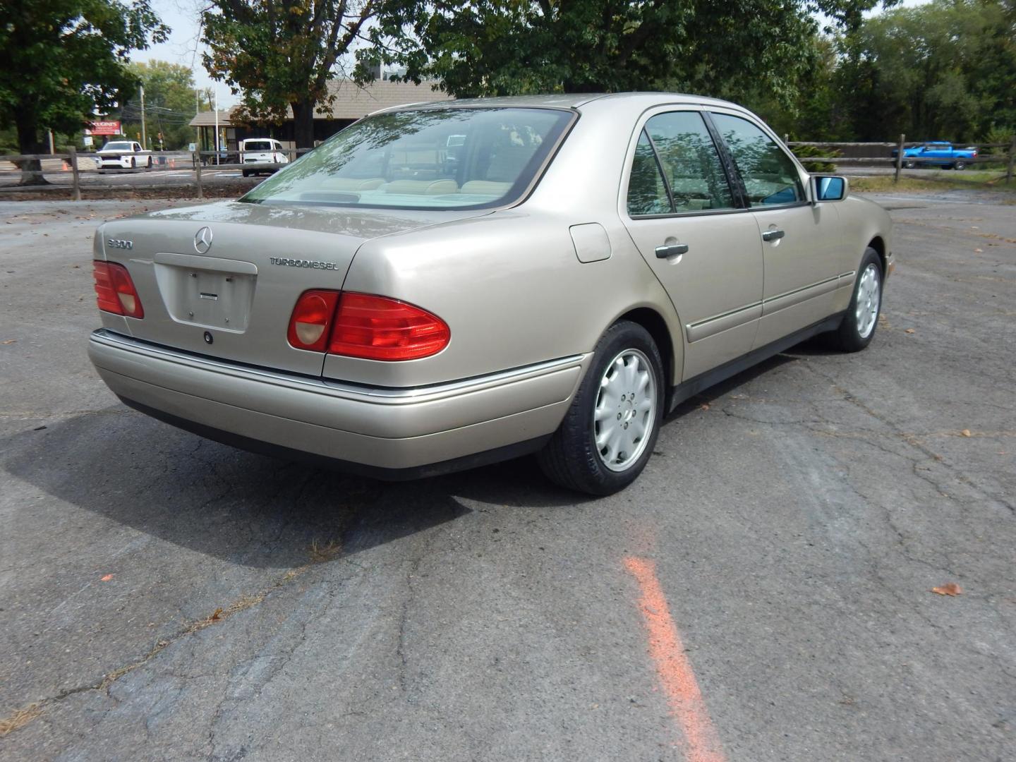 1999 Gold /Tan Mercedes-Benz E-Class E300 (WDBJF25HXXA) with an 3.0L L6 DOHC 24V TURBO DIESEL engine, 5-Speed Automatic Overdrive transmission, located at 6528 Lower York Road, New Hope, PA, 18938, (215) 862-9555, 40.358707, -74.977882 - Here we have a very nicely kept, 2 owner and no accident, 1999 Mercedes E300 with a 3.0L inline 6 cylinder turbo Diesel engine putting power to the rear wheels via an automatic transmission. Options include: tan leather with wood trim, sunroof, power seats, memory seats, AM/FM/CD/TAPE radio, dual cl - Photo#3