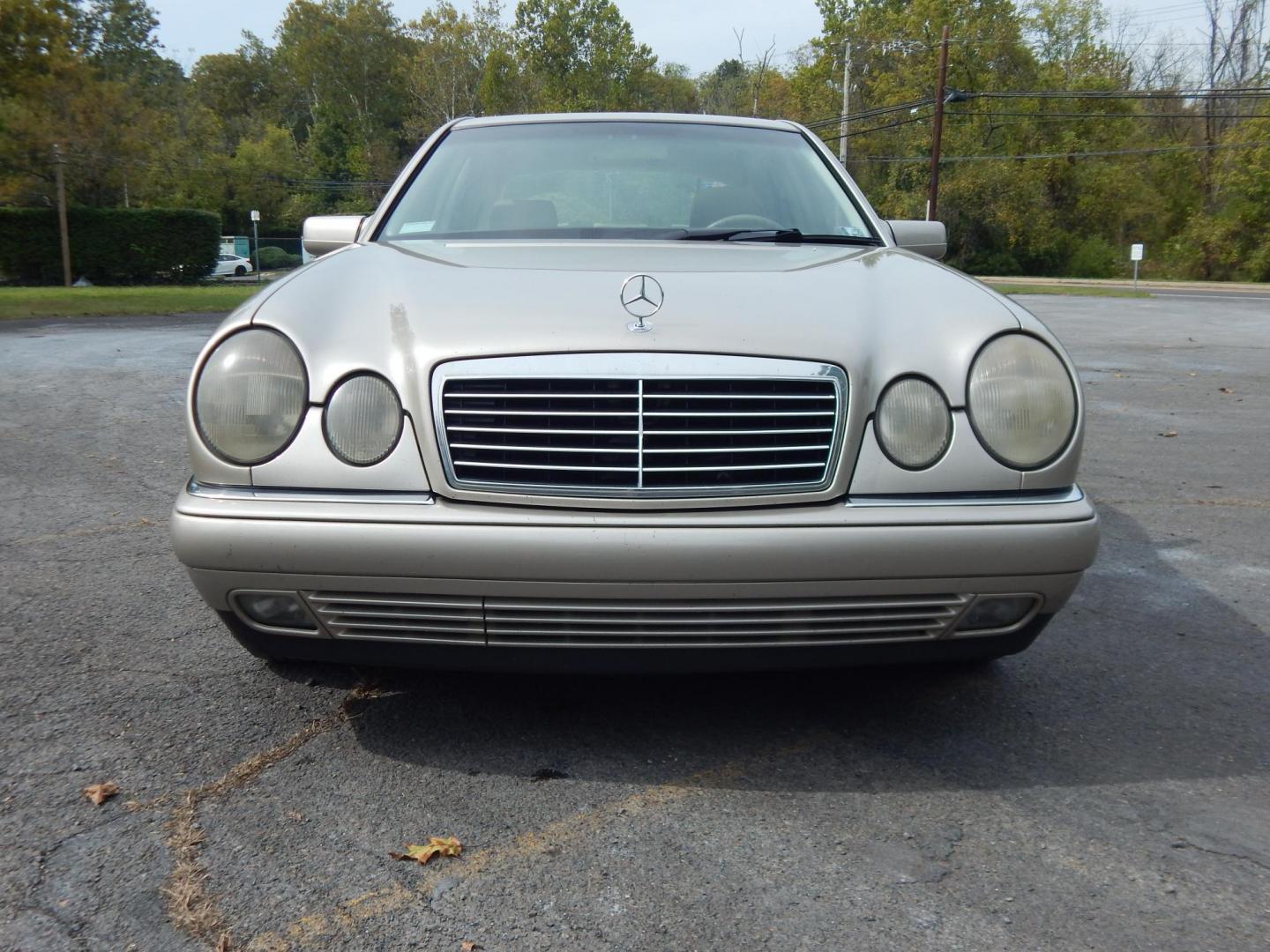 1999 Gold /Tan Mercedes-Benz E-Class E300 (WDBJF25HXXA) with an 3.0L L6 DOHC 24V TURBO DIESEL engine, 5-Speed Automatic Overdrive transmission, located at 6528 Lower York Road, New Hope, PA, 18938, (215) 862-9555, 40.358707, -74.977882 - Here we have a very nicely kept, 2 owner and no accident, 1999 Mercedes E300 with a 3.0L inline 6 cylinder turbo Diesel engine putting power to the rear wheels via an automatic transmission. Options include: tan leather with wood trim, sunroof, power seats, memory seats, AM/FM/CD/TAPE radio, dual cl - Photo#6