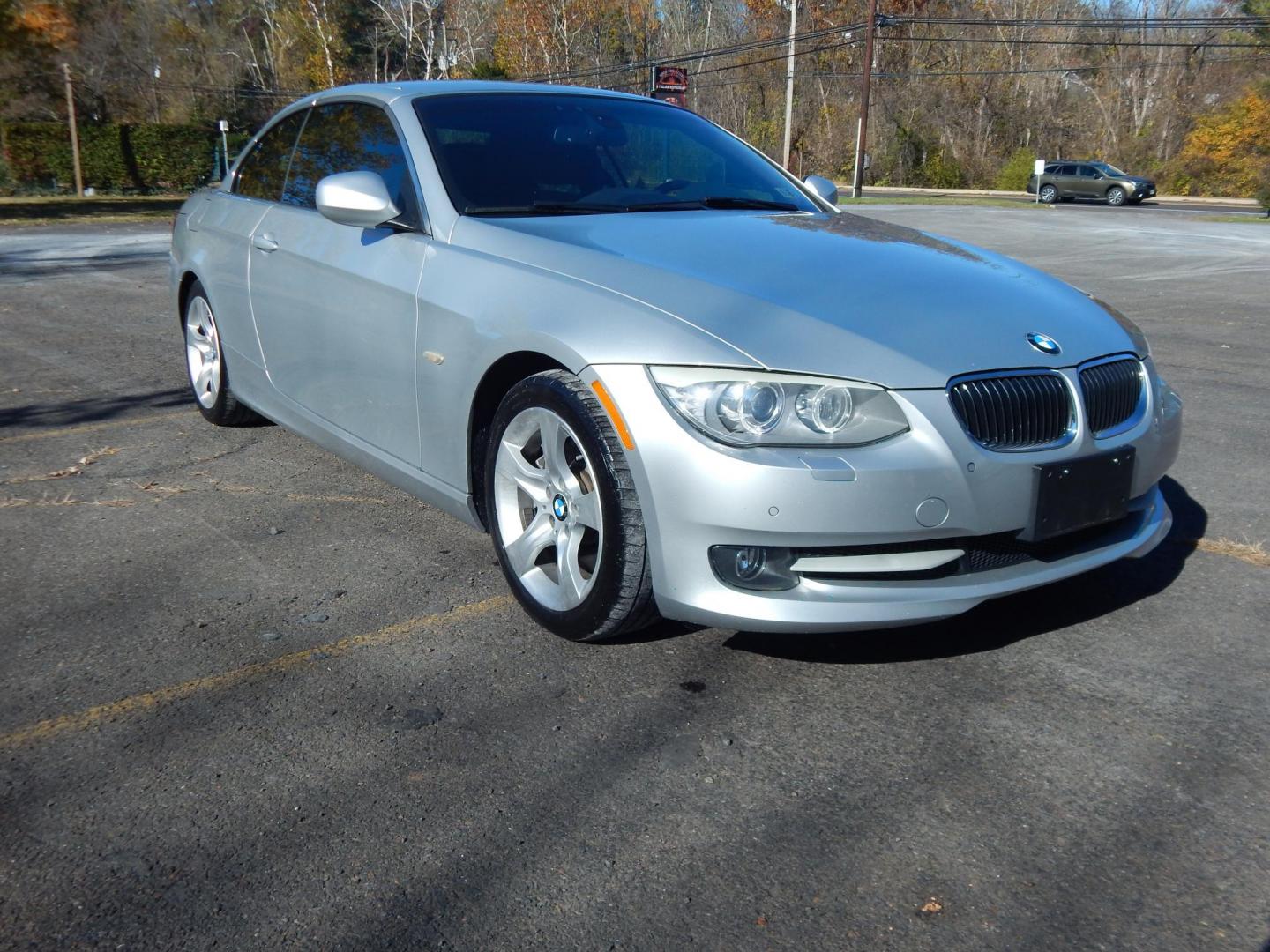 2011 Silver /Black BMW 3-Series 335i Convertible (WBADX7C50BE) with an 3.0L L6 DOHC 24V engine, Automatic transmission, located at 6528 Lower York Road, New Hope, PA, 18938, (215) 862-9555, 40.358707, -74.977882 - Here we have a very nice BMW 335i hard top convertible with a 3.0L turbo six cylinder engine putting power to the rear wheels via a smooth shifting automatic transmission. Options include: black leather, wood trim, dual power seats, heated seats, dual climate controls, AM/FM/CD/AUX radio, automatic - Photo#11