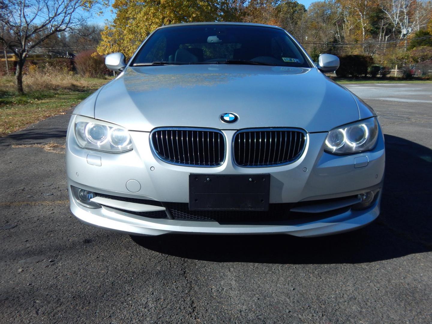 2011 Silver /Black BMW 3-Series 335i Convertible (WBADX7C50BE) with an 3.0L L6 DOHC 24V engine, Automatic transmission, located at 6528 Lower York Road, New Hope, PA, 18938, (215) 862-9555, 40.358707, -74.977882 - Here we have a very nice BMW 335i hard top convertible with a 3.0L turbo six cylinder engine putting power to the rear wheels via a smooth shifting automatic transmission. Options include: black leather, wood trim, dual power seats, heated seats, dual climate controls, AM/FM/CD/AUX radio, automatic - Photo#12