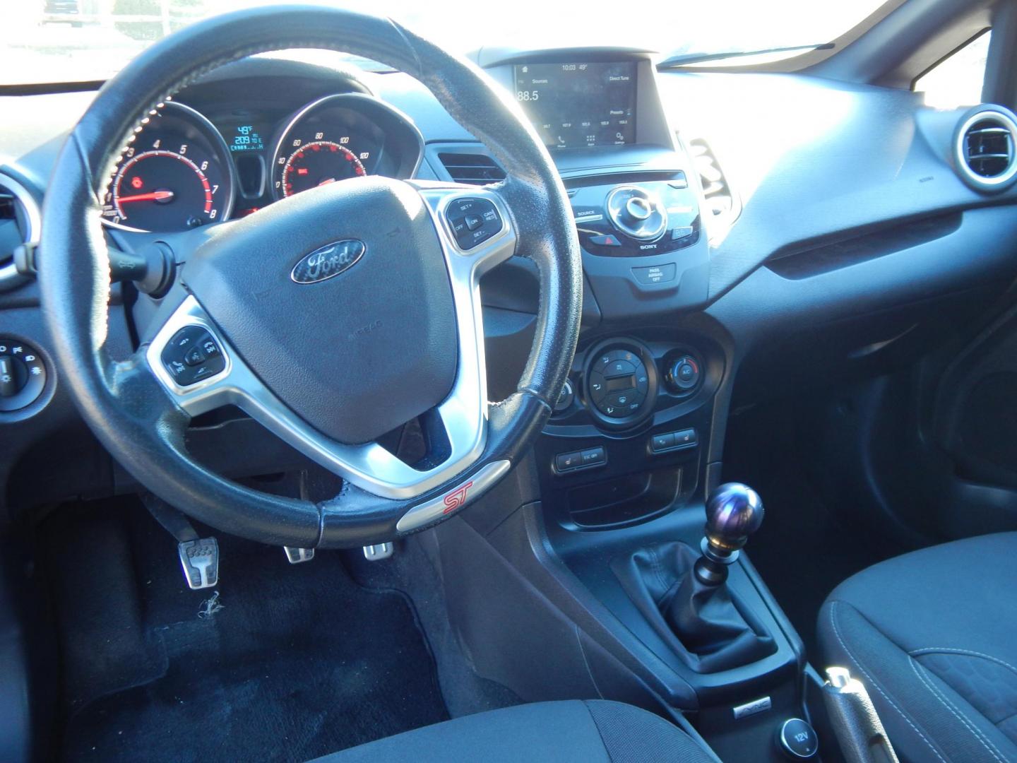 2016 Gray /Black Ford Fiesta ST Hatchback (3FADP4GX1GM) with an 1.6L Turbo engine, 6M transmission, located at 6528 Lower York Road, New Hope, PA, 18938, (215) 862-9555, 40.358707, -74.977882 - Here we have a very fun to drive, Ford Fiesta ST with a 1.6L turbo engine putting power to the front wheels via a 6 speed manual transmission. Options include: black cloth, heated front seats, AC/heat, AM/FM/CD/SAT/BLUETOOTH radio, cruise control, tilt steering wheel, automatic headlights, power win - Photo#11