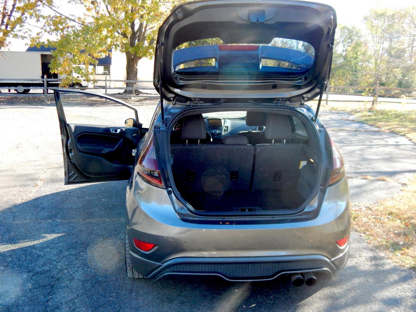 2016 Gray /Black Ford Fiesta ST Hatchback (3FADP4GX1GM) with an 1.6L Turbo engine, 6M transmission, located at 6528 Lower York Road, New Hope, PA, 18938, (215) 862-9555, 40.358707, -74.977882 - Here we have a very fun to drive, Ford Fiesta ST with a 1.6L turbo engine putting power to the front wheels via a 6 speed manual transmission. Options include: black cloth, heated front seats, AC/heat, AM/FM/CD/SAT/BLUETOOTH radio, cruise control, tilt steering wheel, automatic headlights, power win - Photo#12