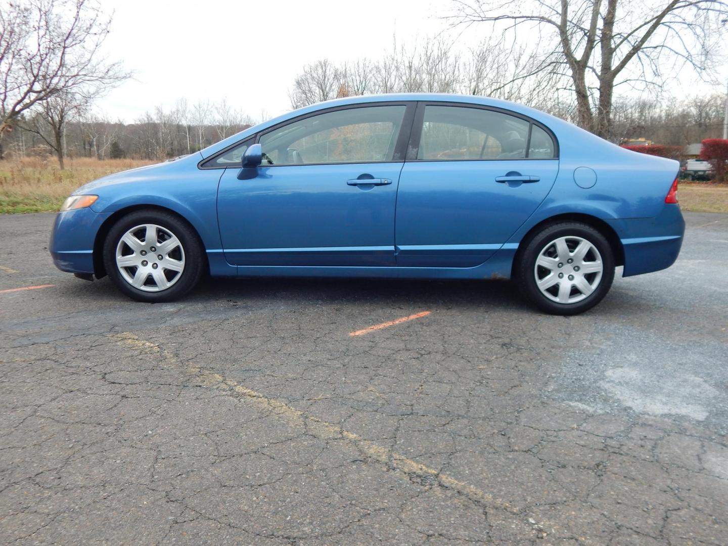 2008 Blue /Gray Honda Civic LX Sedan (1HGFA15528L) with an 1.8L L4 SOHC 16V engine, 5-Speed Manual Overdrive transmission, located at 6528 Lower York Road, New Hope, PA, 18938, (215) 862-9555, 40.358707, -74.977882 - Here we have a ONE OWNER, Honda Civic with a 1.8L inline 4 cylinder engine putting power to the front wheels via a smooth shifting 5 speed manual transmission. Options include: gray cloth, manual seats, AC, heat, AM/FM/CD/AUX radio, tilt steering wheel, cruise control, power windows/locks/mirrors an - Photo#1